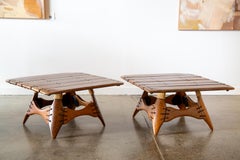 Coppia di tavolini Navajo Pacific Green in legno di palma, ferro e pelle c.C. anni 2000