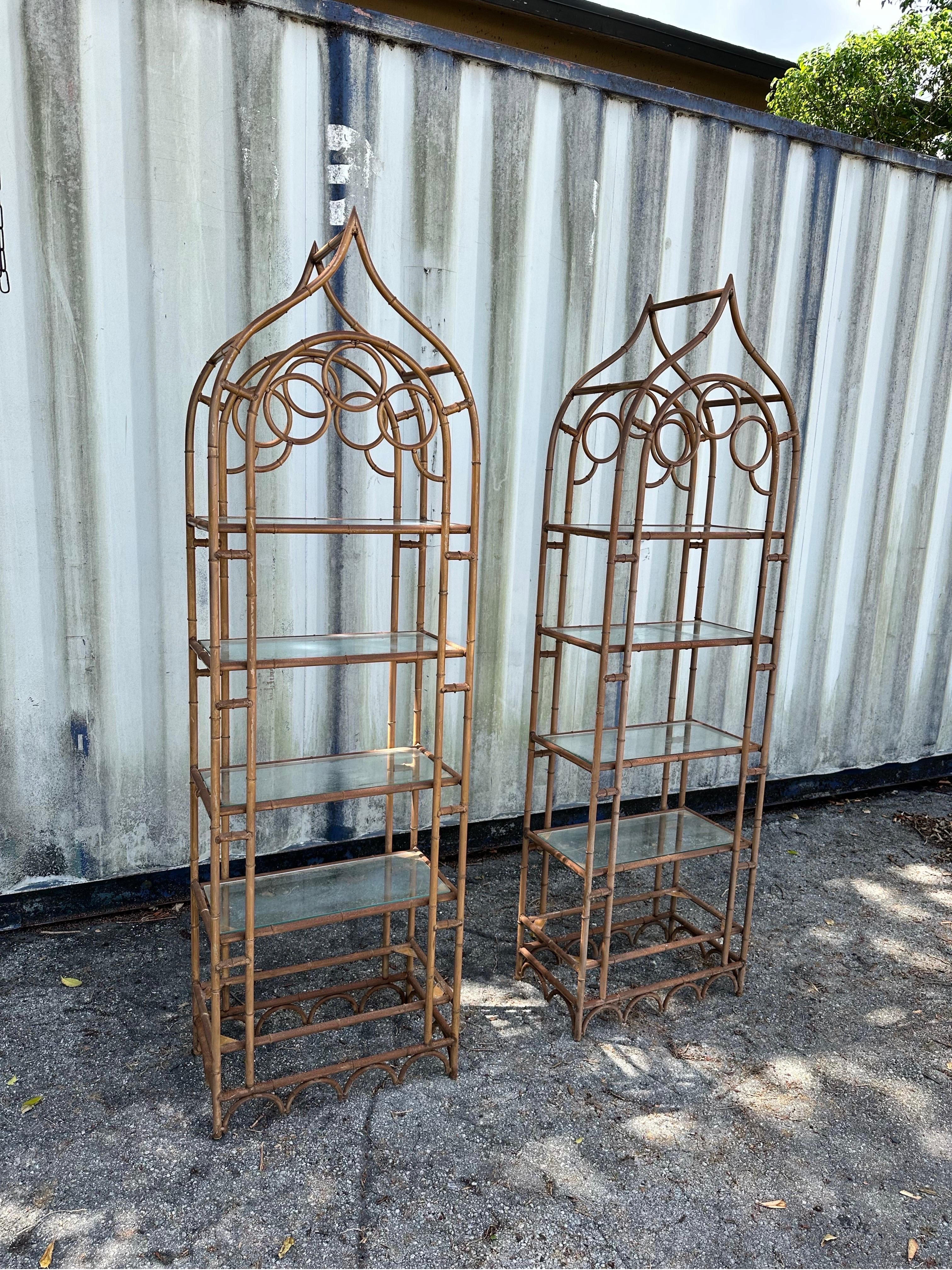 Pair of Pagoda bamboo shape bookshelves.
6 glass shelves.
Distressed look , sturdy and stable .
