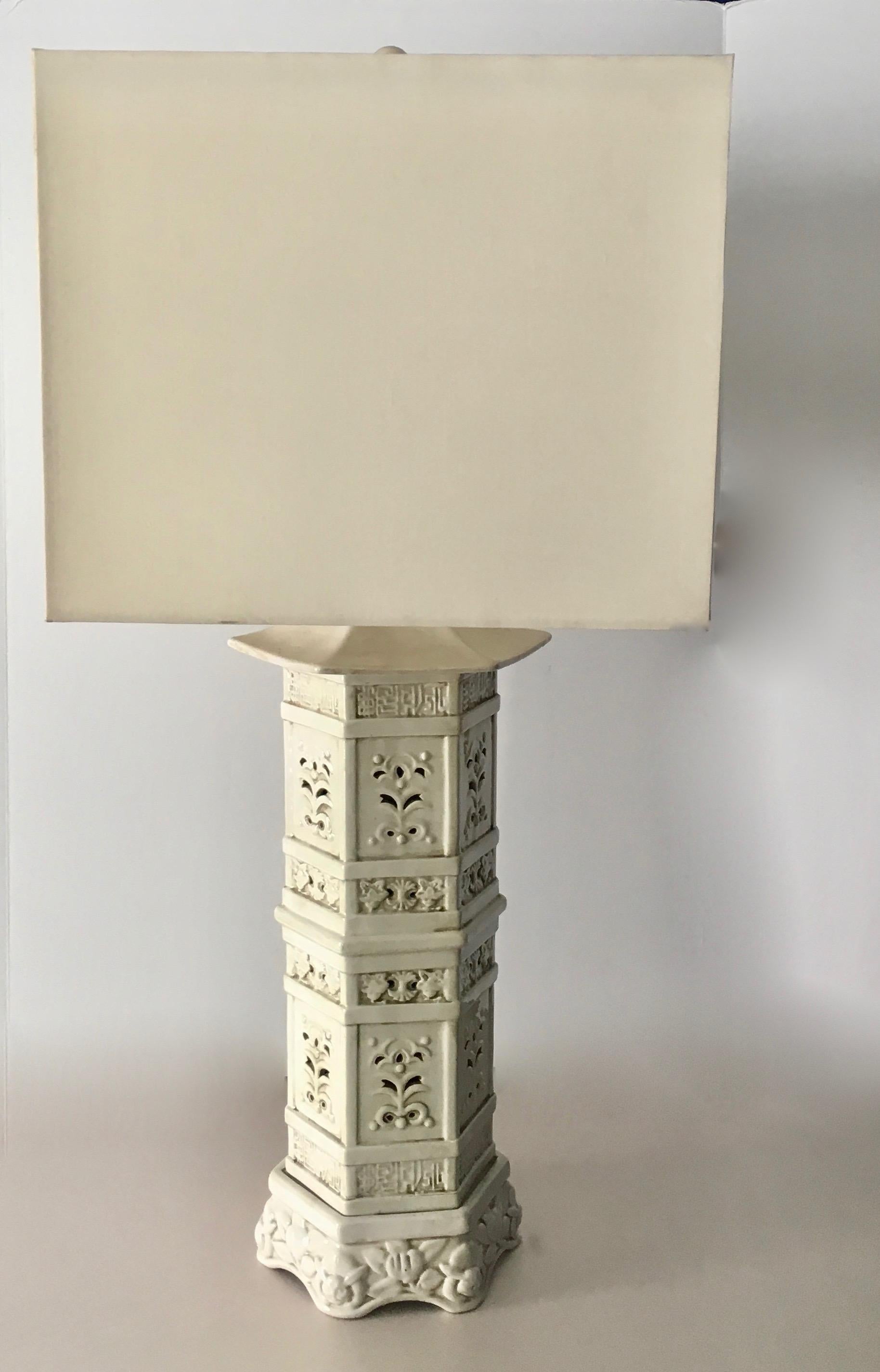 Pair of Pagoda style Italian ceramic lamps - lamps are rewired and have a night light inside the canister portion of the lamp. Elegant and perfect for your new living room, bedroom or den. The lamps include shades

Shade is 14.5 square.