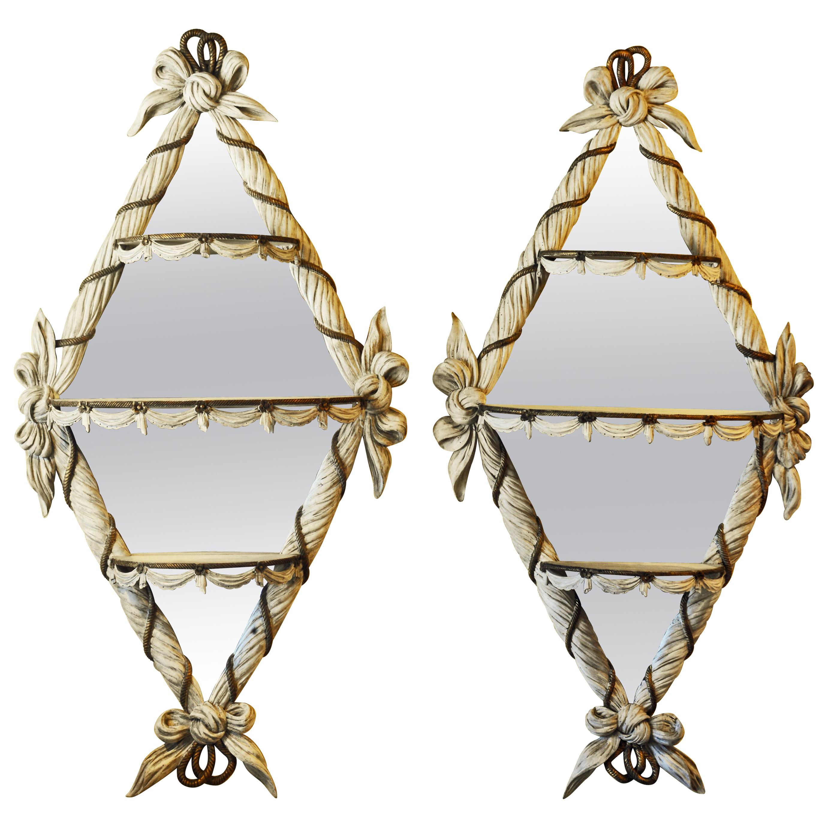 Pair of Paint and gilt Scarf carved Diamond Shape Mirrors with Demilune Shelves