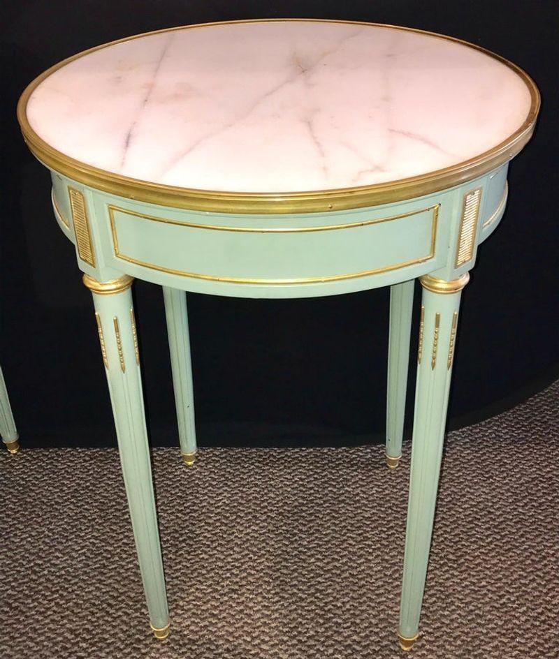 A pair of Jansen style bronze-mounted marble-top bouilliotte or end tables. A fine custom quality pair of end or bouilliotte / gueridon tables. Each having gray green cases with tapering legs all with bronze corners which start and terminate in