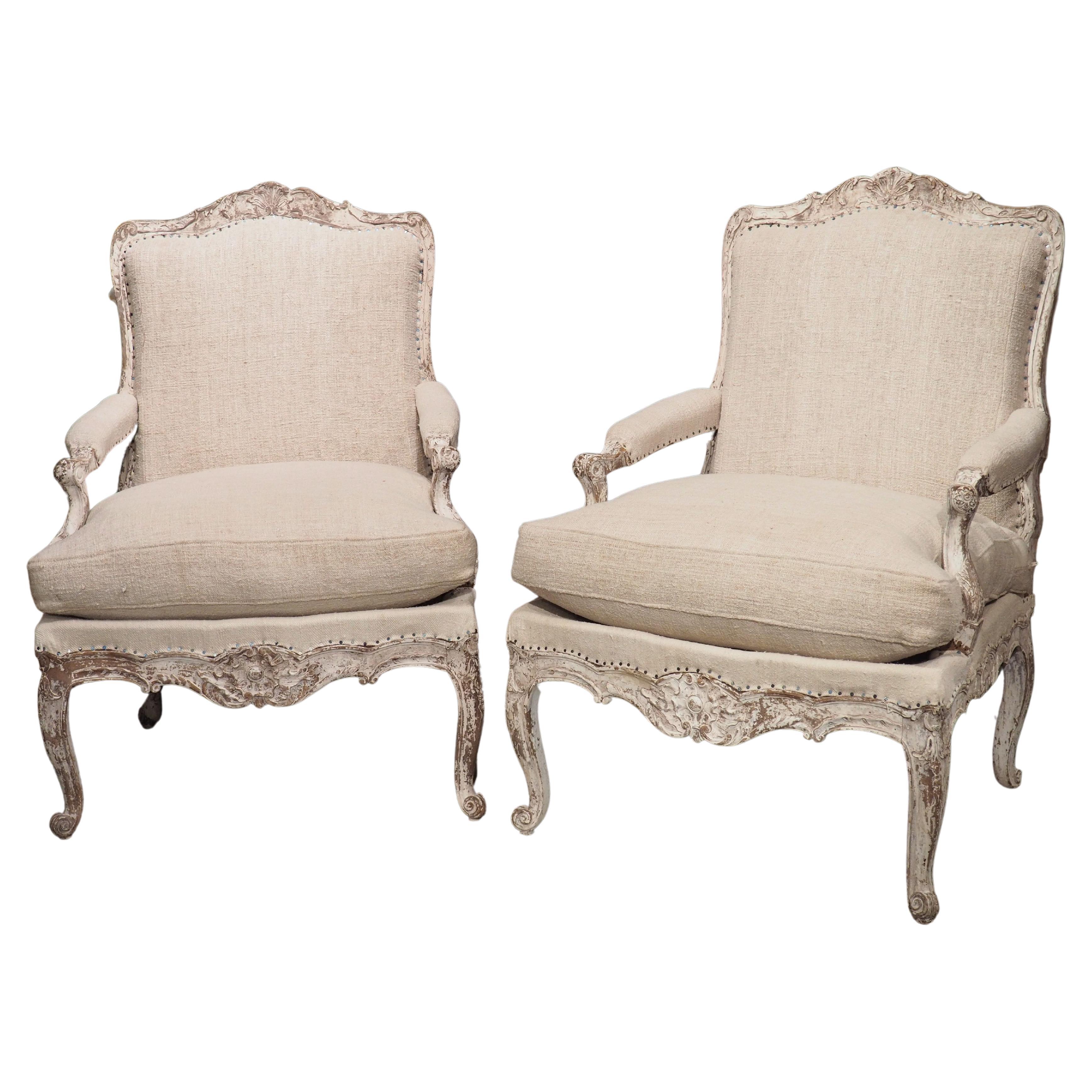 Pair of Painted and Distressed French Regence Style Fauteuil Armchairs, C. 1915