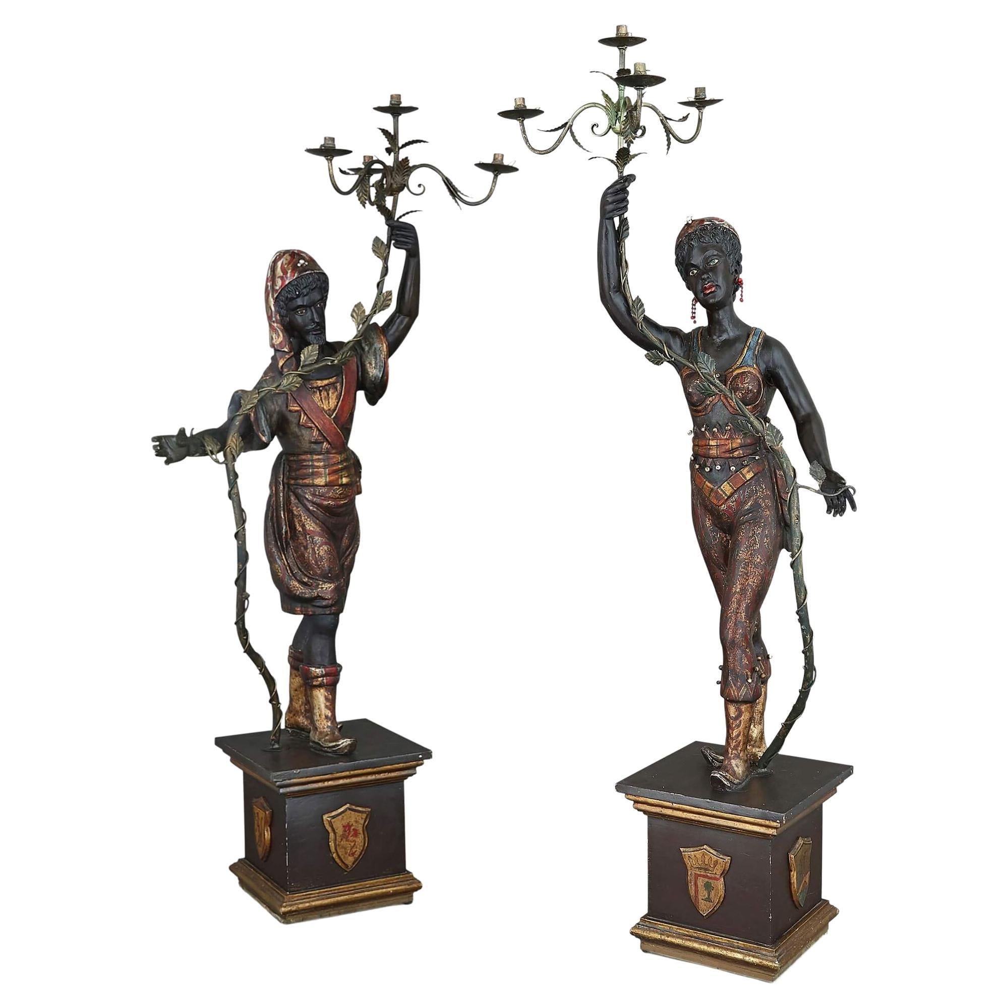 Pair of Painted and Ebonised Wood Floor-Standing Figurative Candelabra For Sale