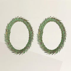 Pair of Painted and Gilt Tole Laurel Wreaths