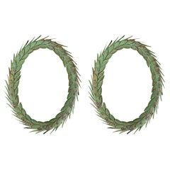 Pair of Painted and Gilt Tole Laurel Wreaths