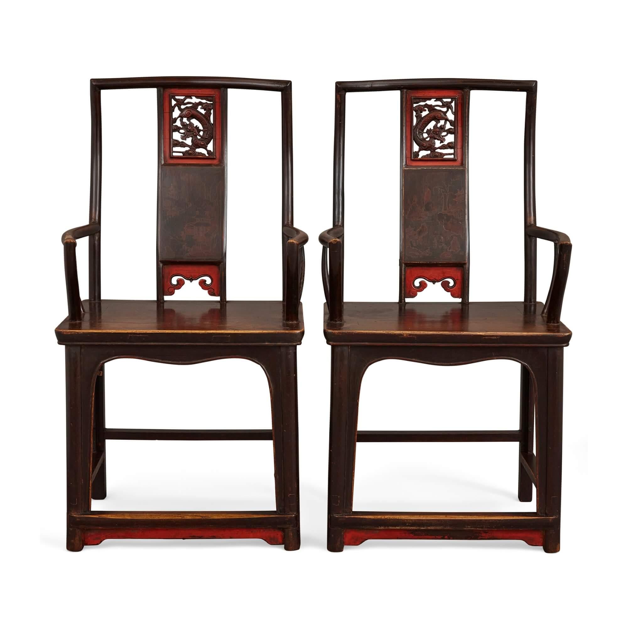 Pair of lacquered and painted Chinese yoke back armchairs.
Chinese, 19th century.
Measures: Height 108cm, width 56cm, depth 43cm.

Featuring a top rail supported by an s-shaped splat, which is comprised of three panels, this fine pair of works