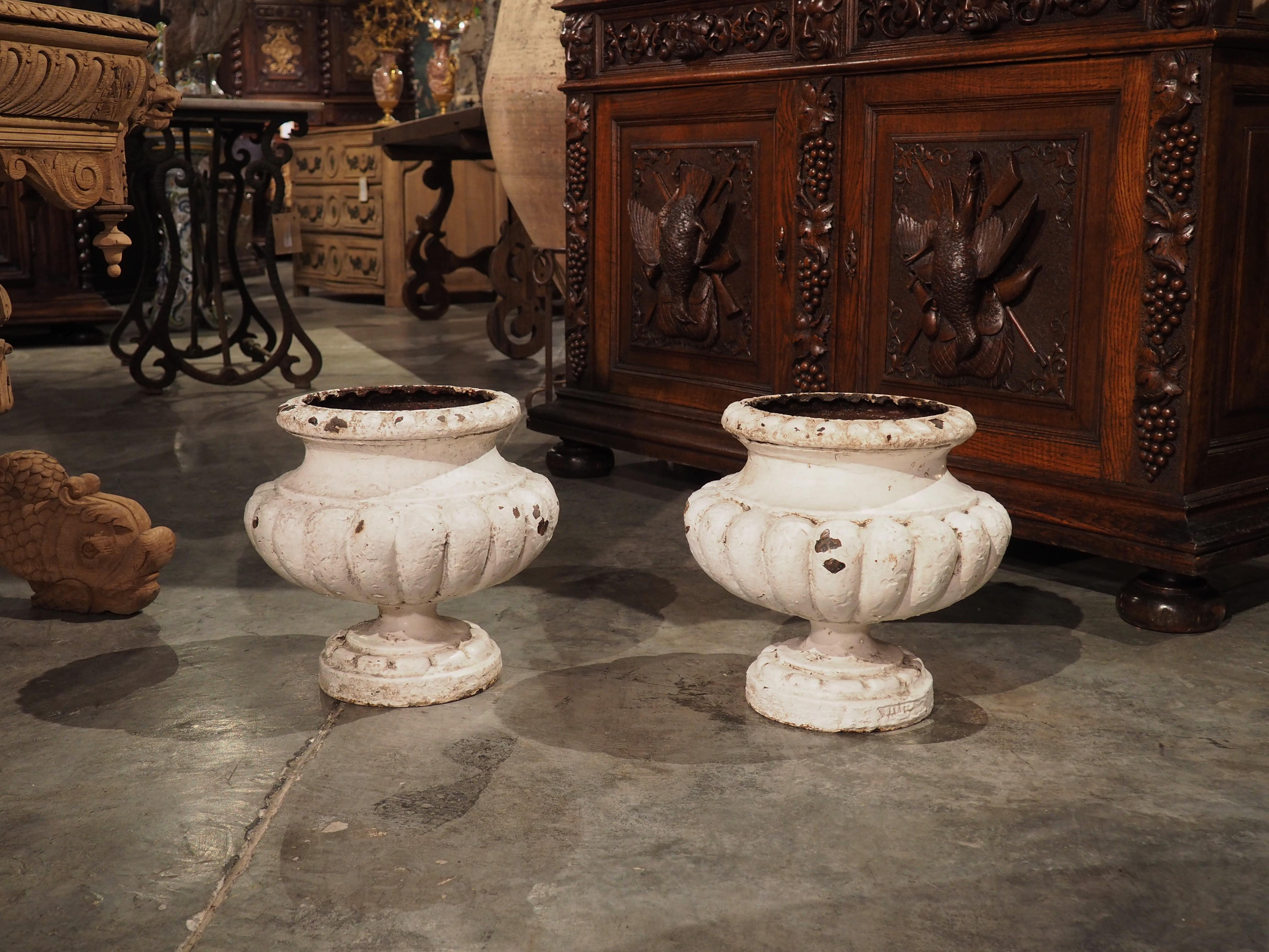 French Pair of Painted and Lobed 19th Century Cast Iron Vases from France