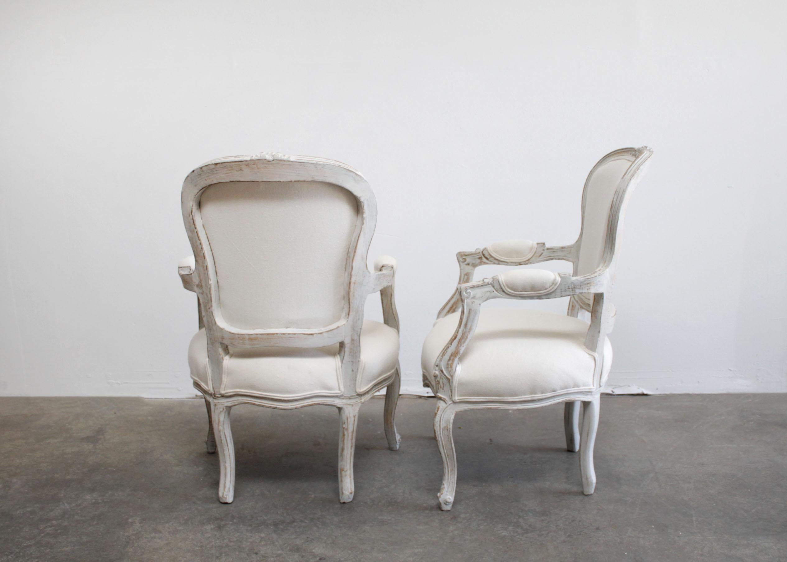 20th Century Pair of Painted and Upholstered Louis XV Style Open Armchairs