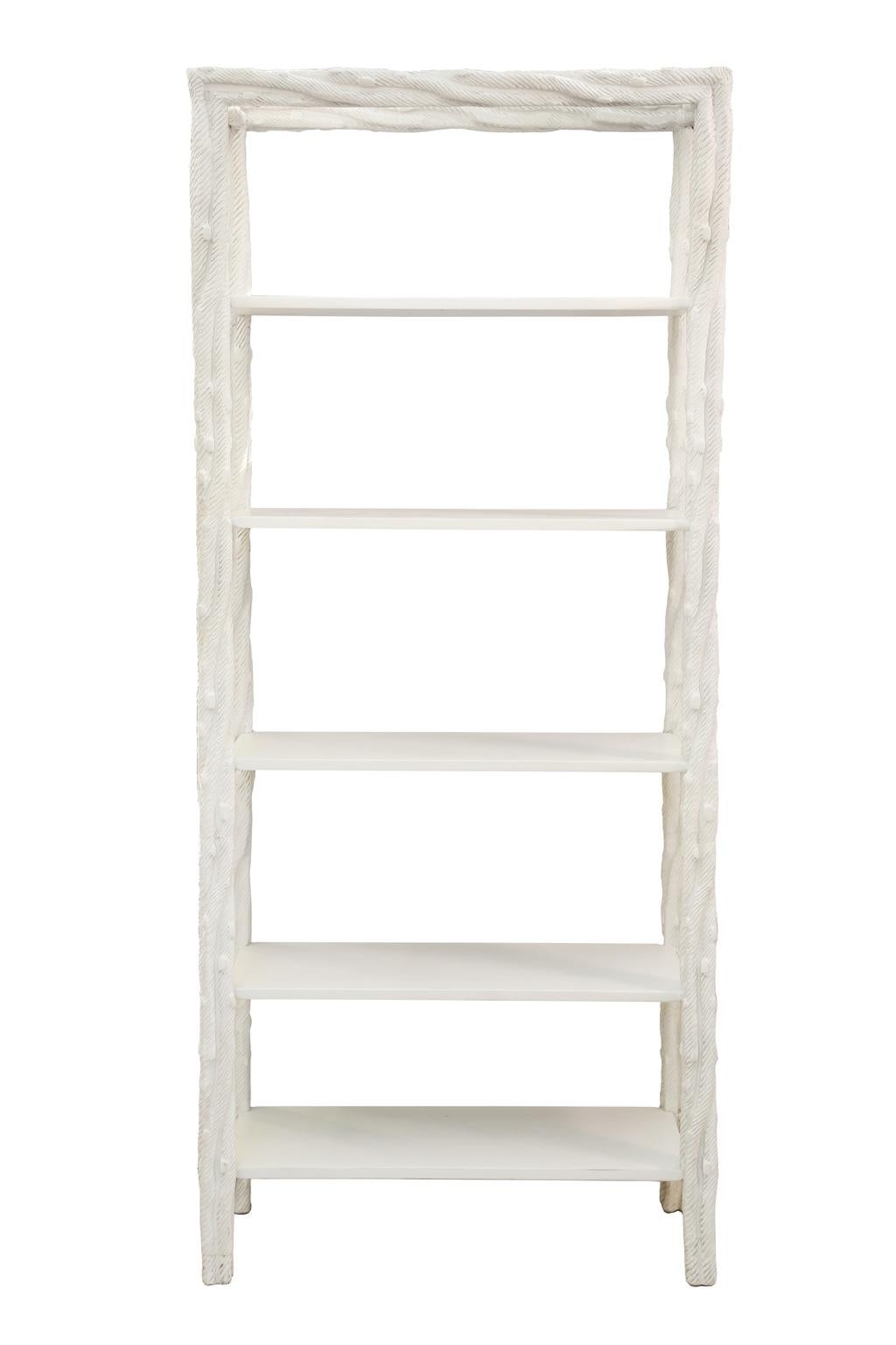 Pair of shelving units, each white painted frame carved to resemble raw wooden branches, holding five rectangular shelves.

Stock ID: D2459.