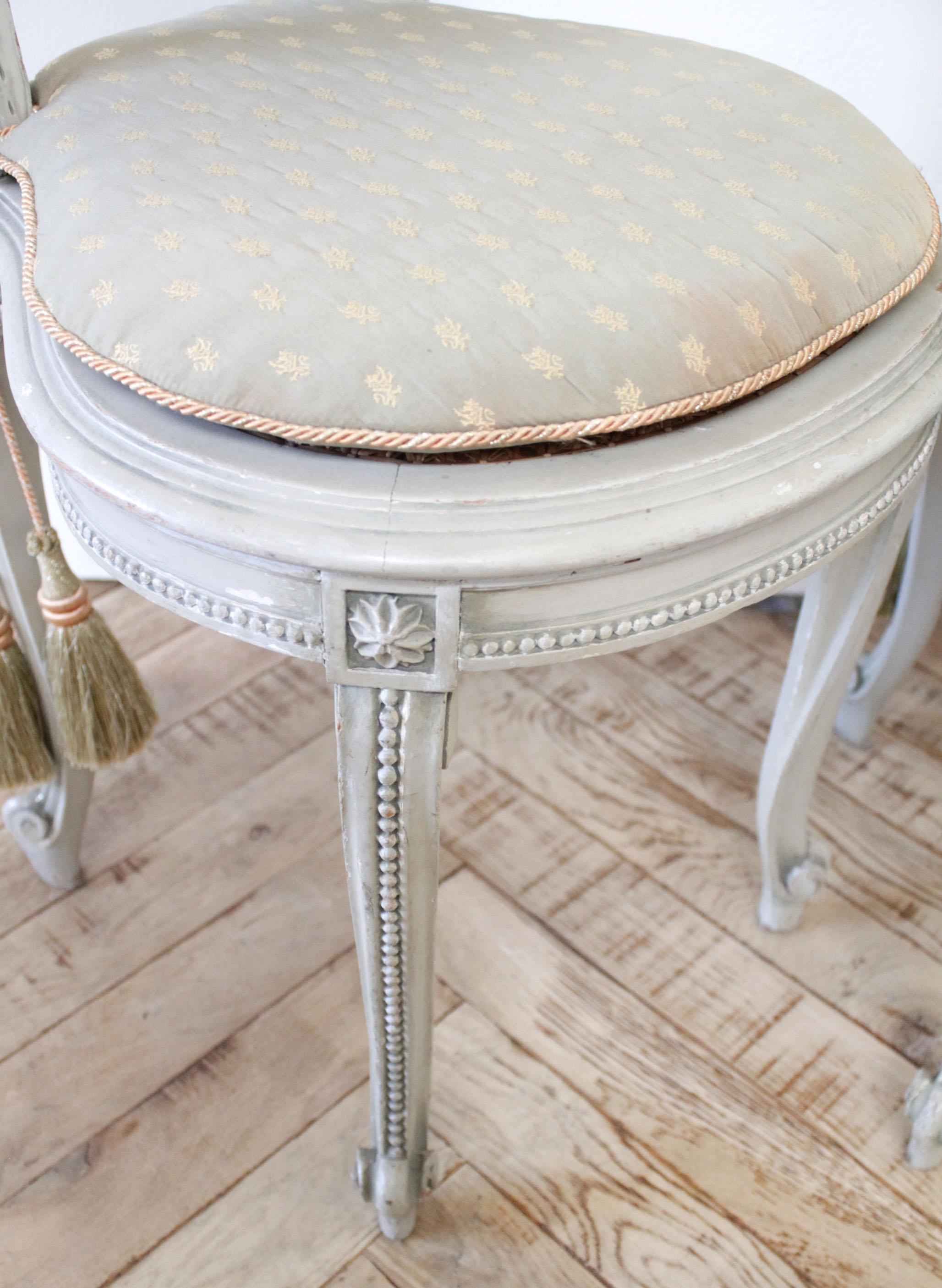 Pair of Painted Cane Back Ribbon Carved Vanity Chairs 1