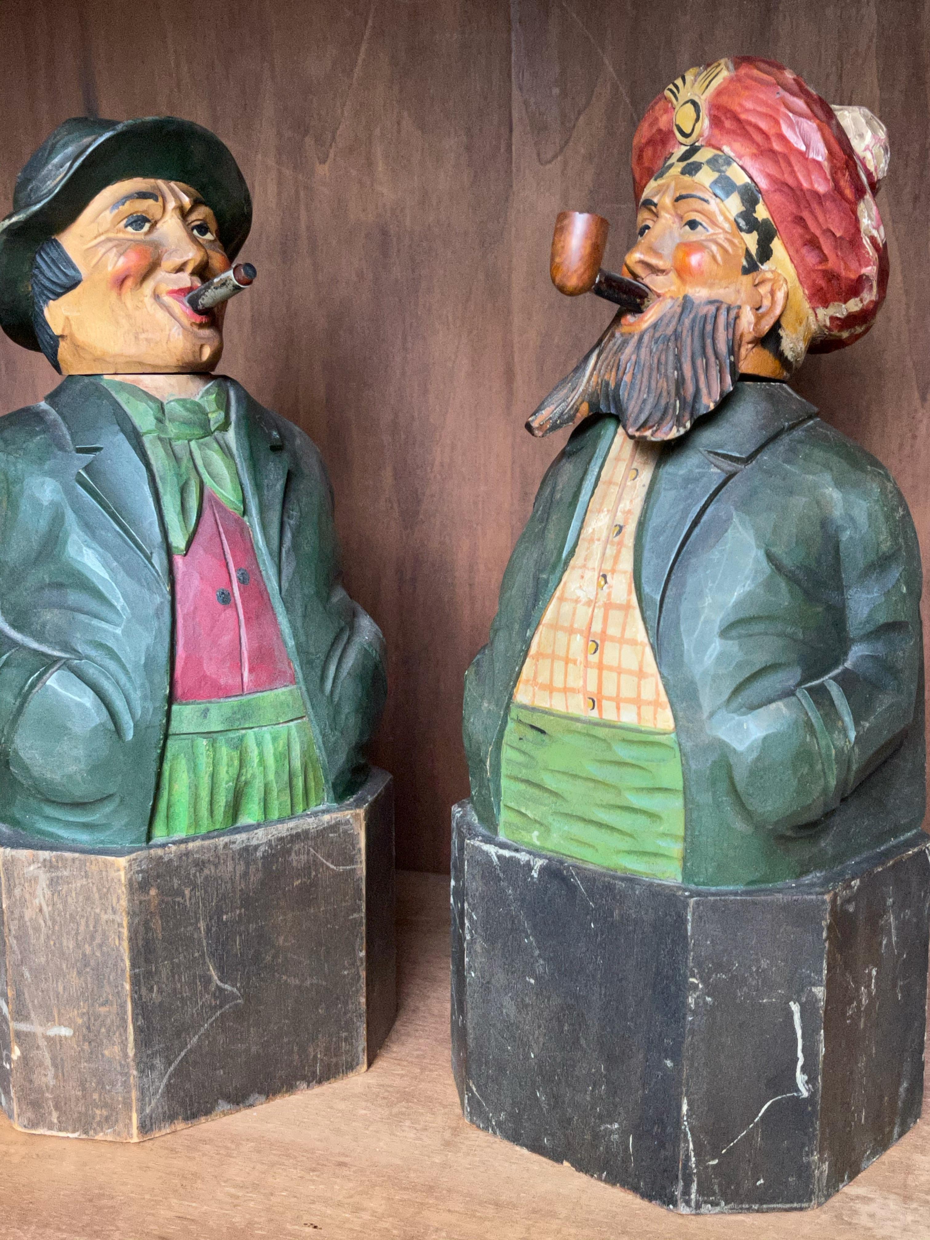 Great novelty items for collectors and lovers of rare barware. 

These rare sculptural decanters from the 1930s make real cool talking pieces. The heads come off and inside these hand-carved, pipe and cigar smoking tiplers there is a glass bottle.