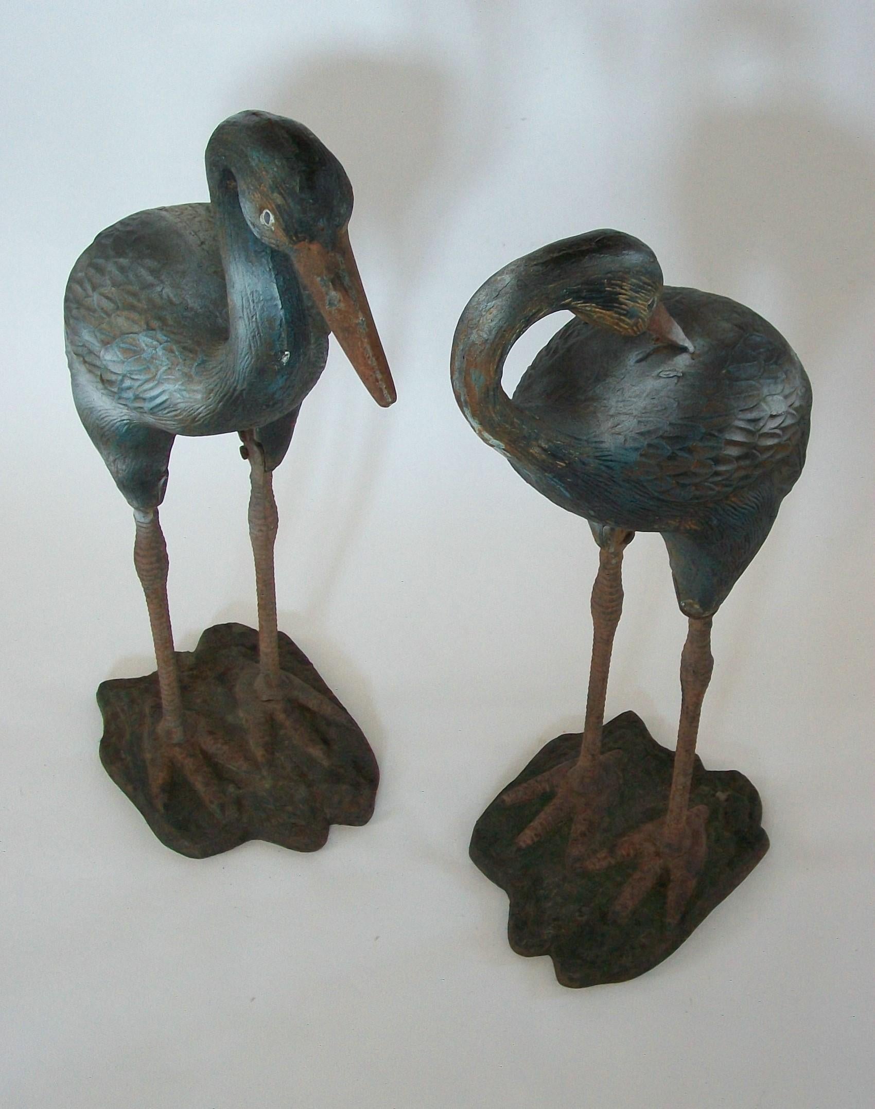 20th Century Pair of Painted Cast Iron Heron Garden Sculptures - France - circa 1930s For Sale