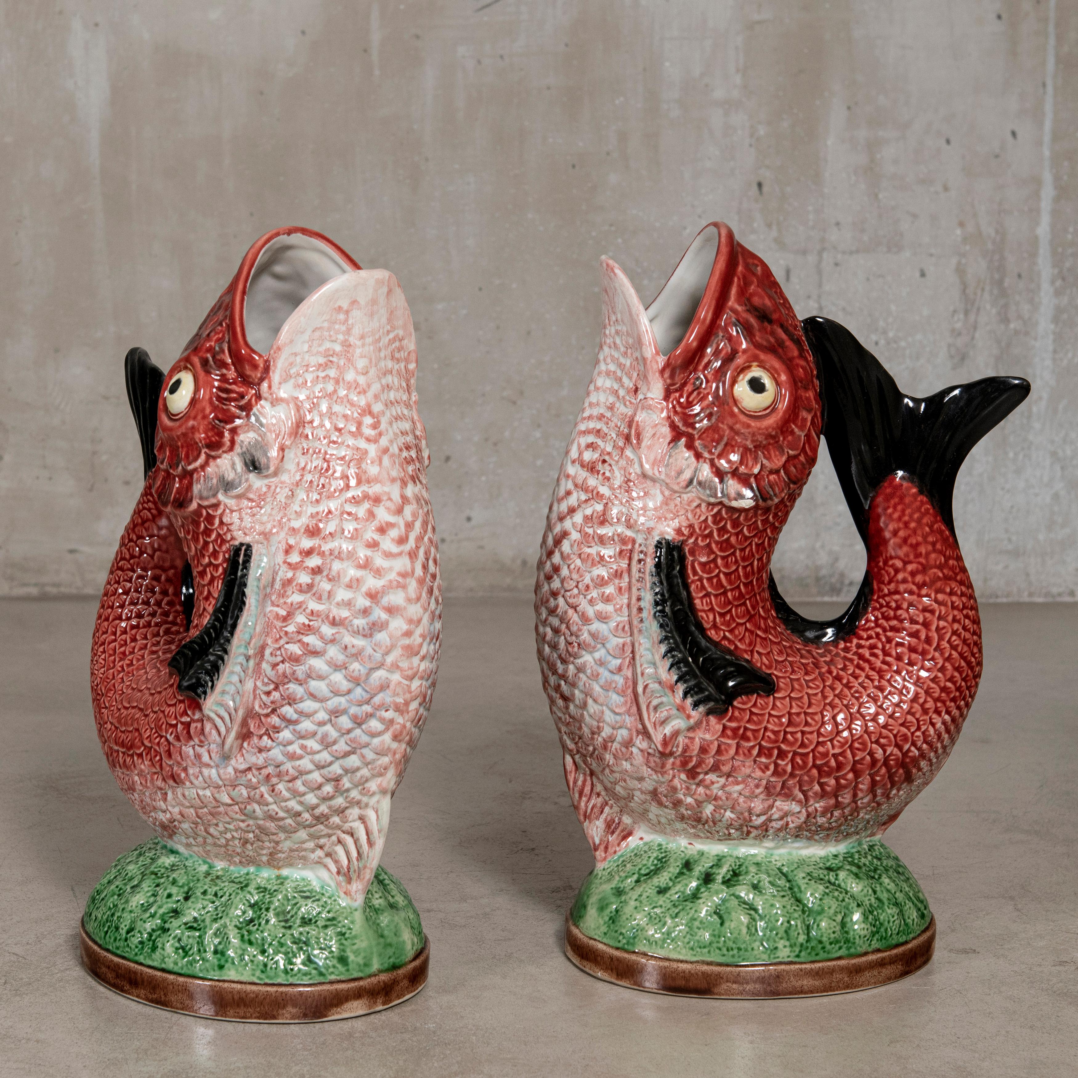Pair of painted ceramic fish pitchers by Bordallo Pinheiro, Portugal, circa 1900.