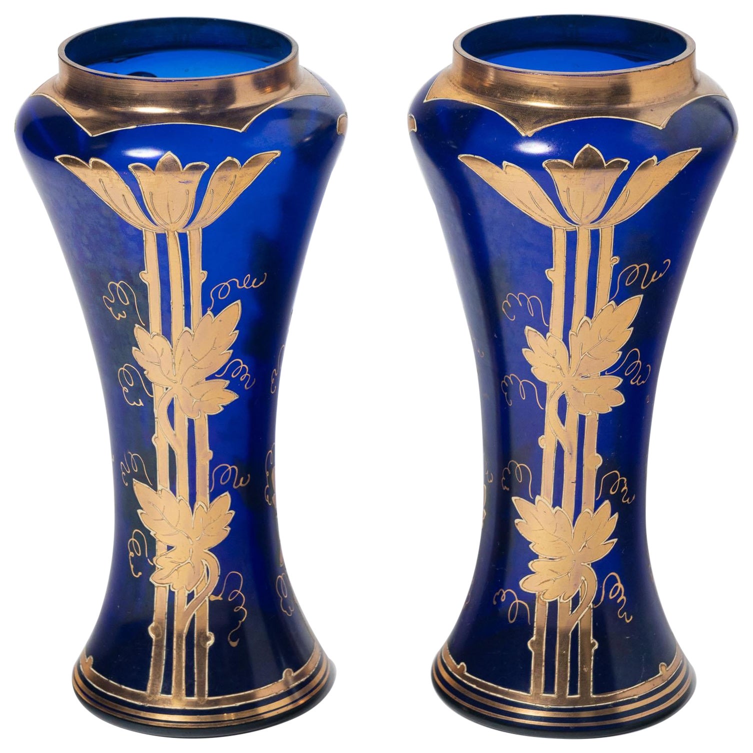 Pair of painted gold and glass vases. France, Early 20th Century.
