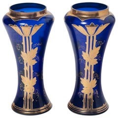 Pair of painted gold and glass vases. France, Early 20th Century.