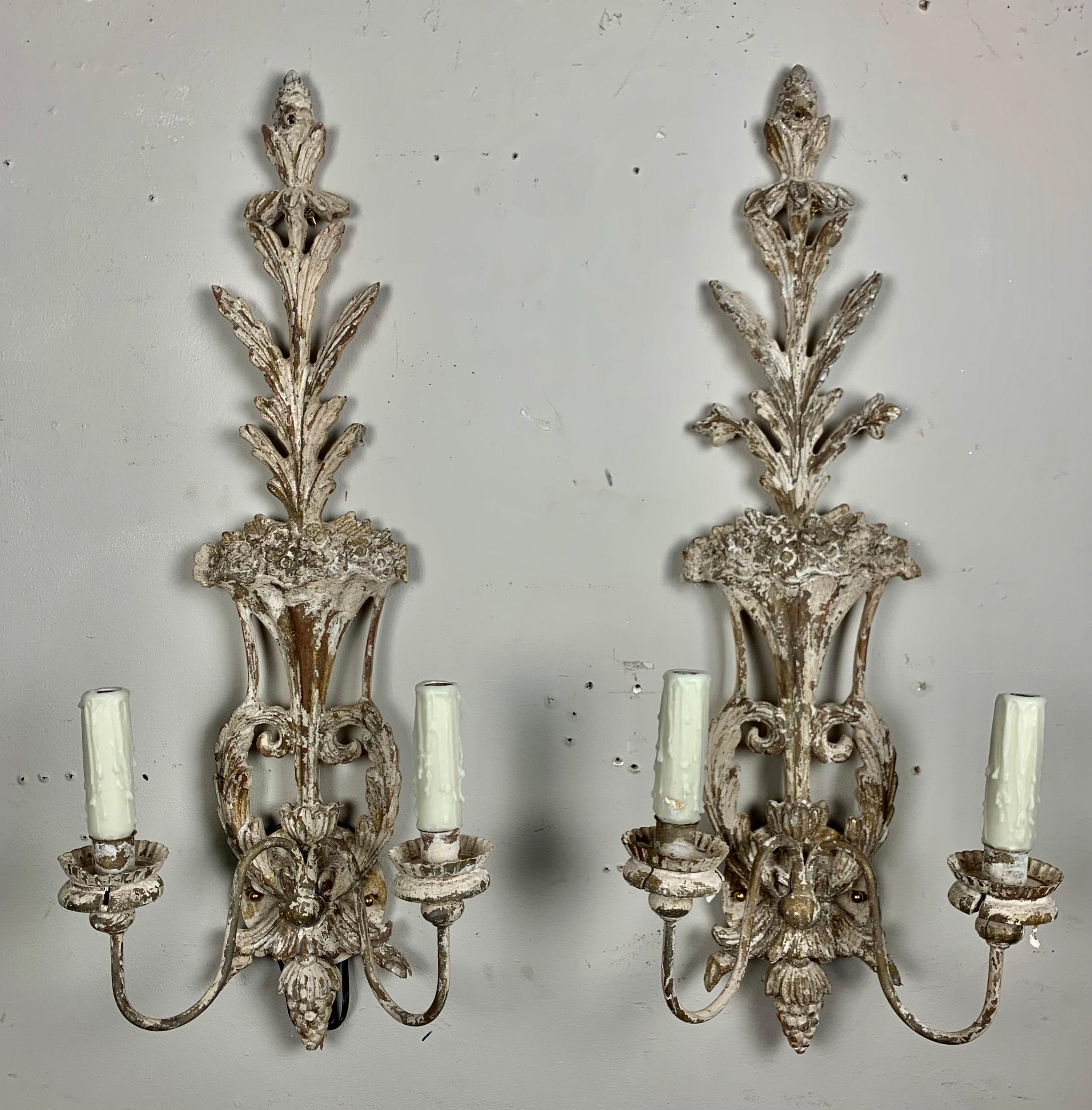 Pair of carved wood Italian painted 2-light sconces newly rewired with drip wax candle covers. Ready to install.