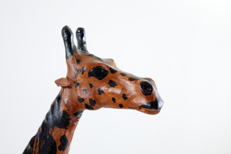Indian Pair of Painted Leather Giraffe Sculptures For Sale