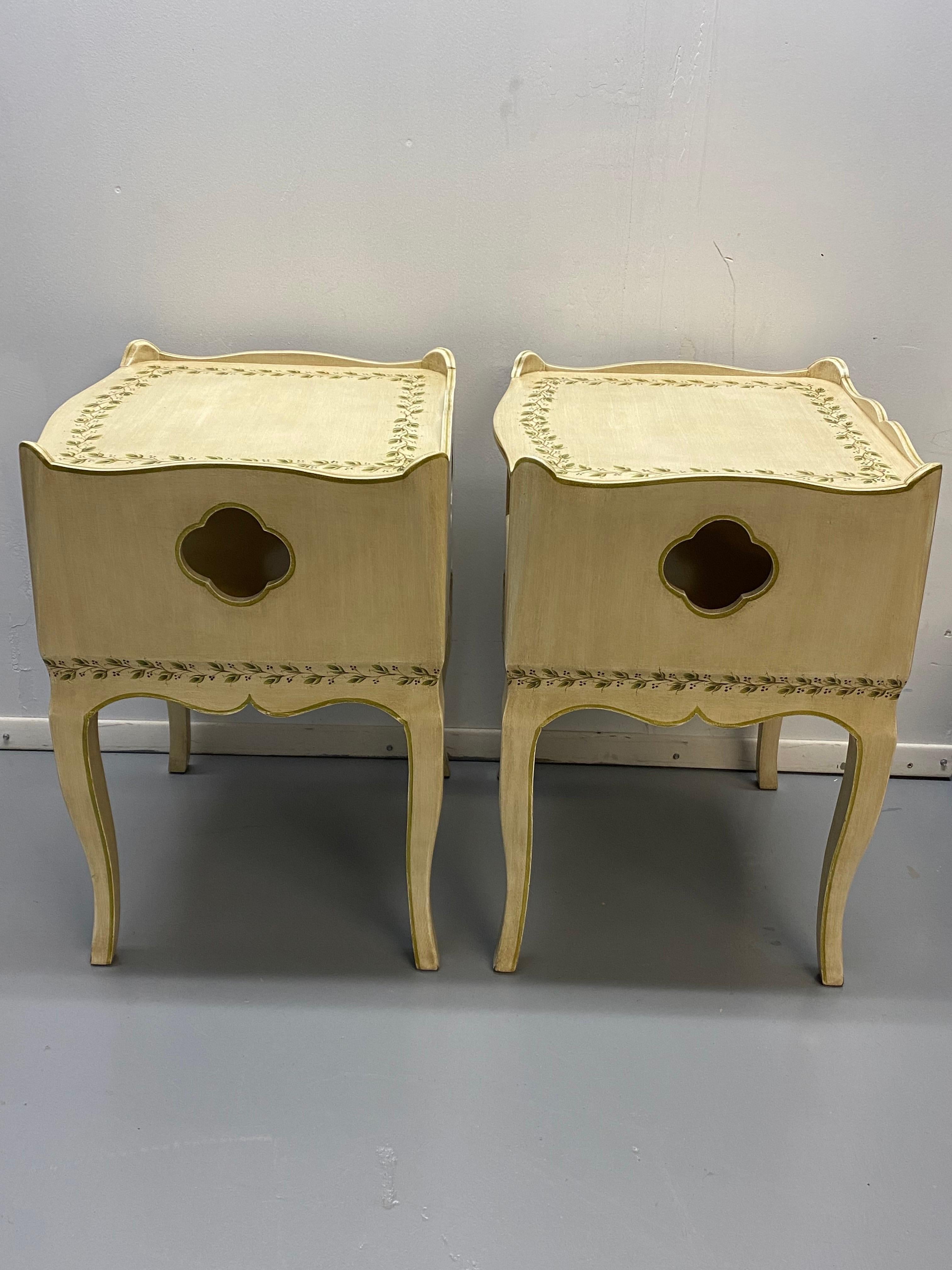 Pair of Painted Louis XV Style Night Stands with Leaf Decoration
Custom made nightstands with an open shelf and a dished top, clover cut out windows on three sides and hand painted leaf and berry decoration. Artist signature underside,
