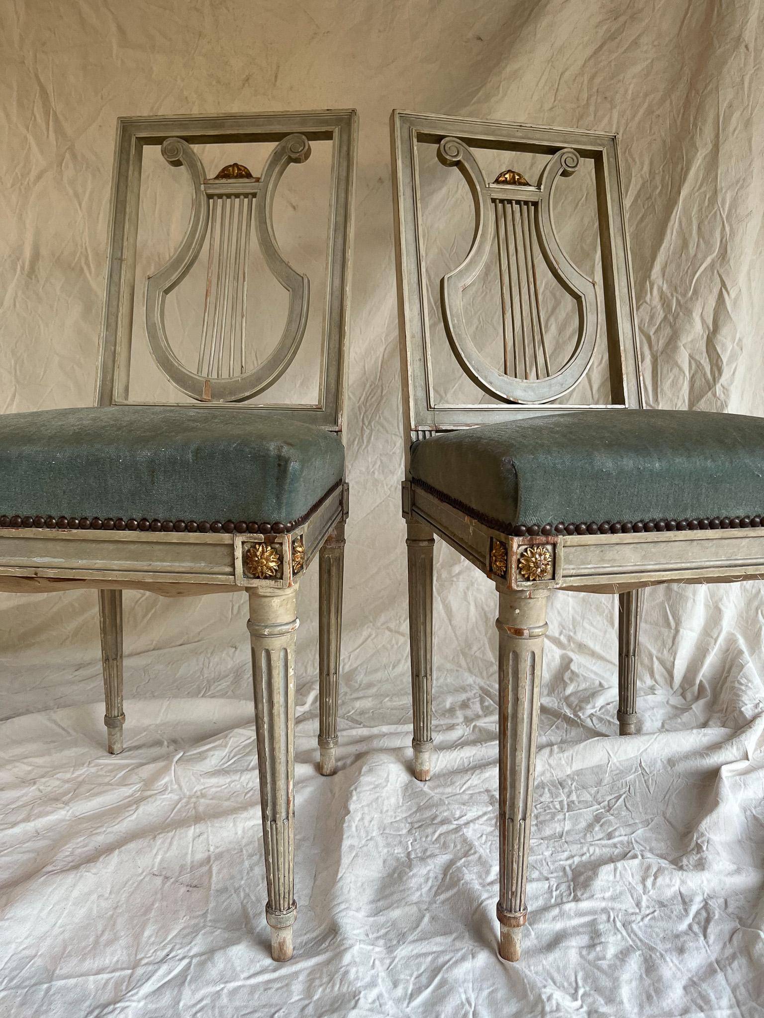 Velvet Pair of painted Louis XVI style chairs with blue velvet seat