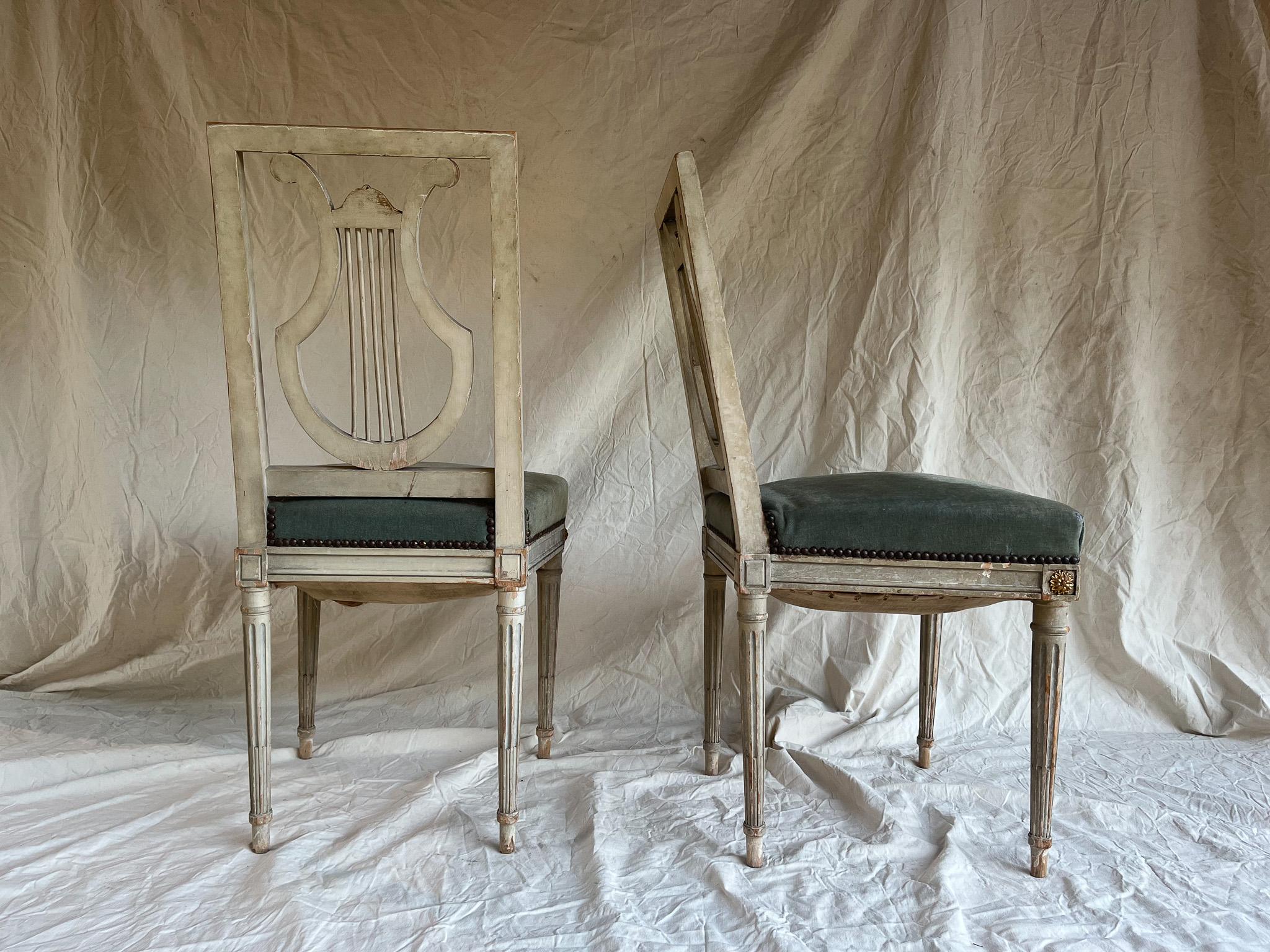 Pair of painted Louis XVI style chairs with blue velvet seat 2