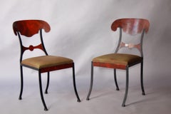 Pair of painted metal decorative chairs