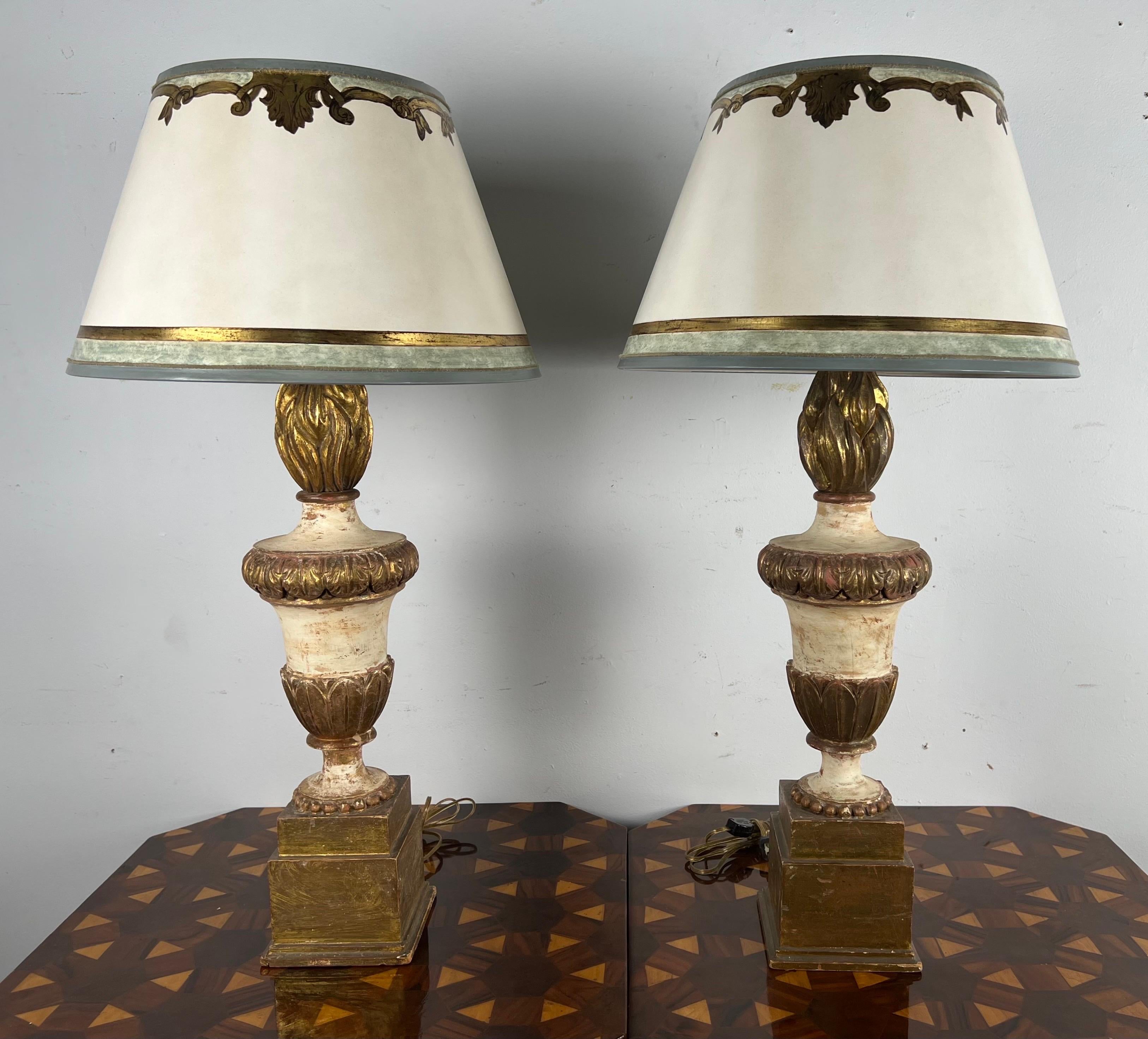 Pair of Painted & Parcel Gilt Carved Flame Lamps w/ Parchment Shades In Distressed Condition For Sale In Los Angeles, CA