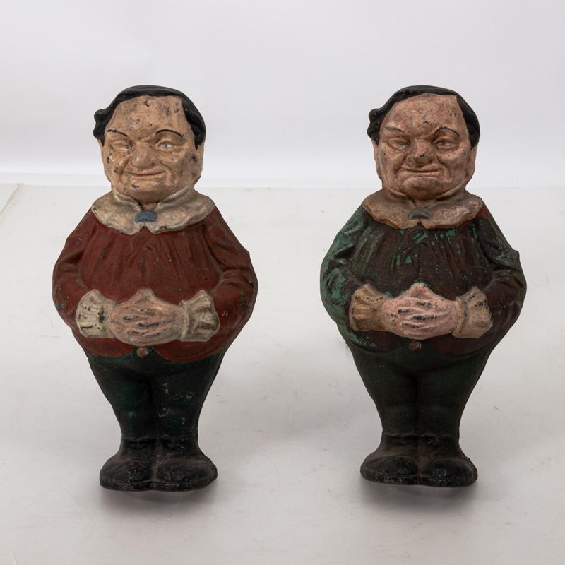 Pair of painted polychrome decorated andirons in cast iron of Tweddle Dee and Tweddle Dum, circa 1880s. Made in England. Please note of wear consistent with age including minor oxidation, paint loss, and chips.