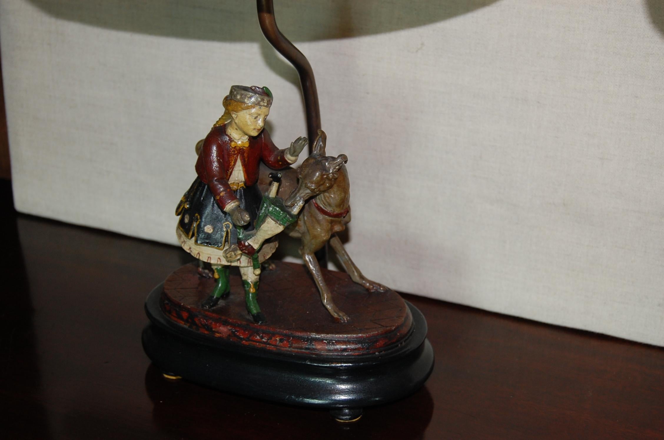 Hand-Crafted Pair of Painted Tin Figures of Children Mounted as Lamps For Sale
