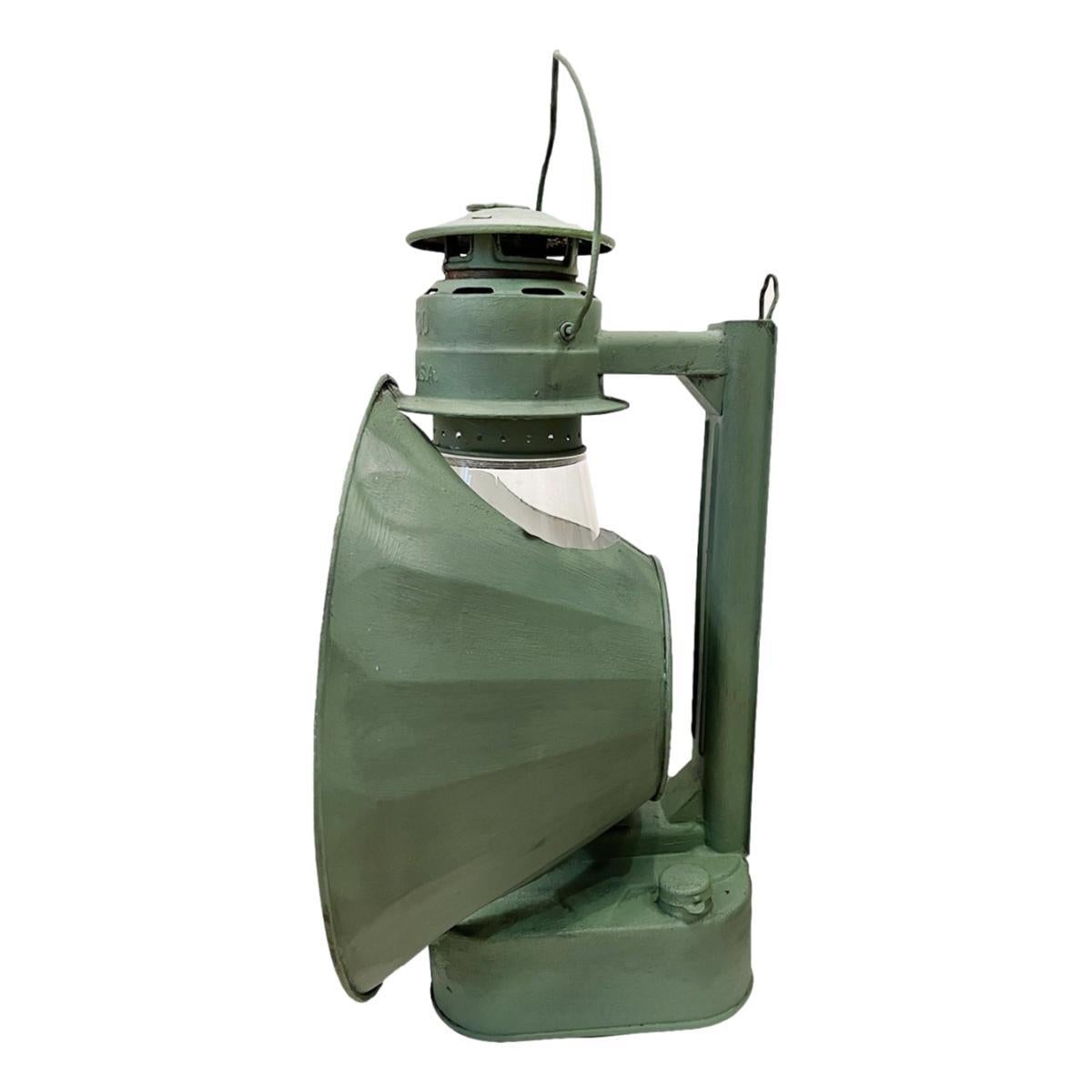Pair of circa 1940's American tole lanterns with glass globes.

Measurements:
Height: 16
