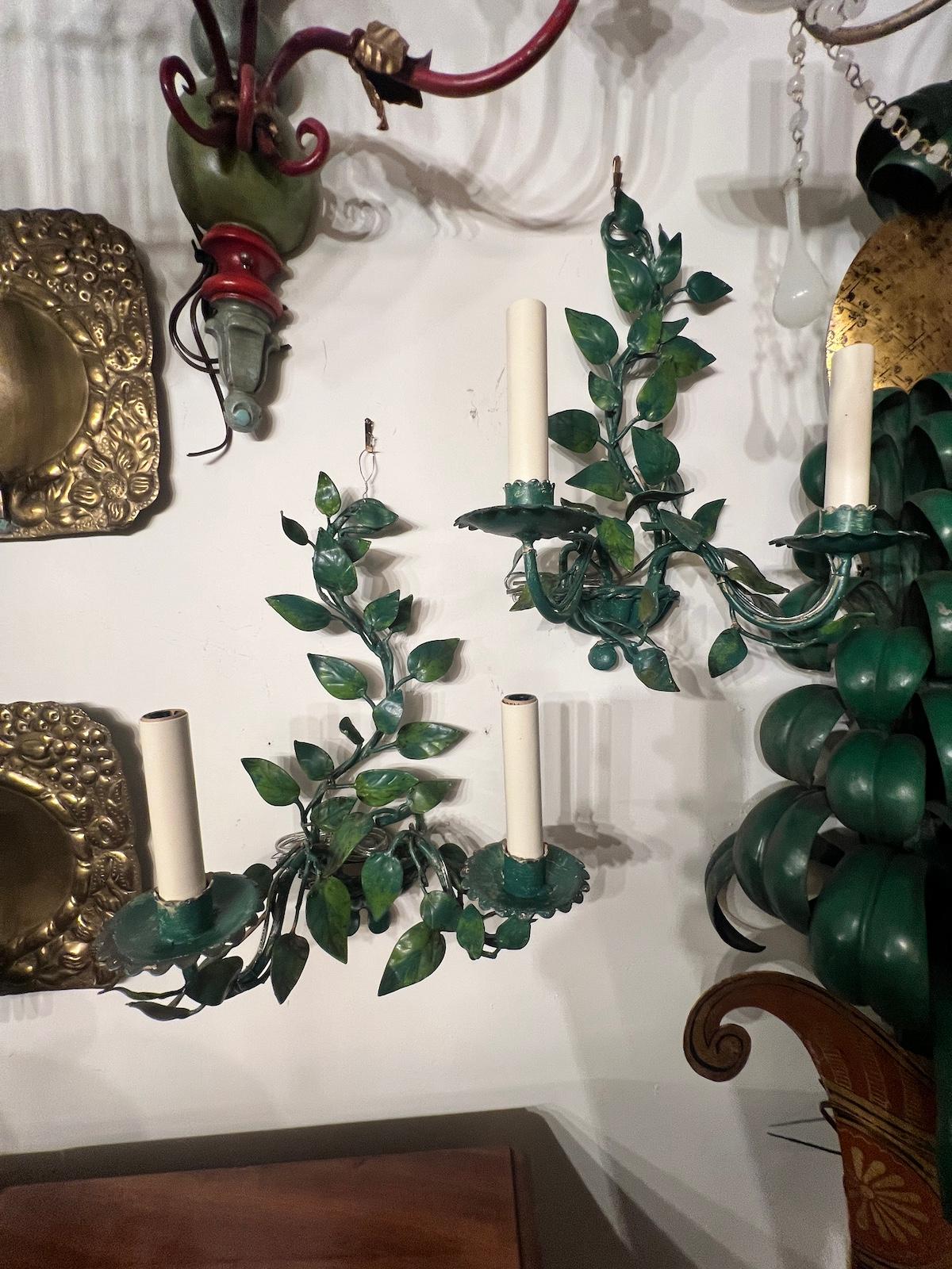 Pair of 1960's Italian foliage sconces with original painted patina.

Measurements:
Height: 17