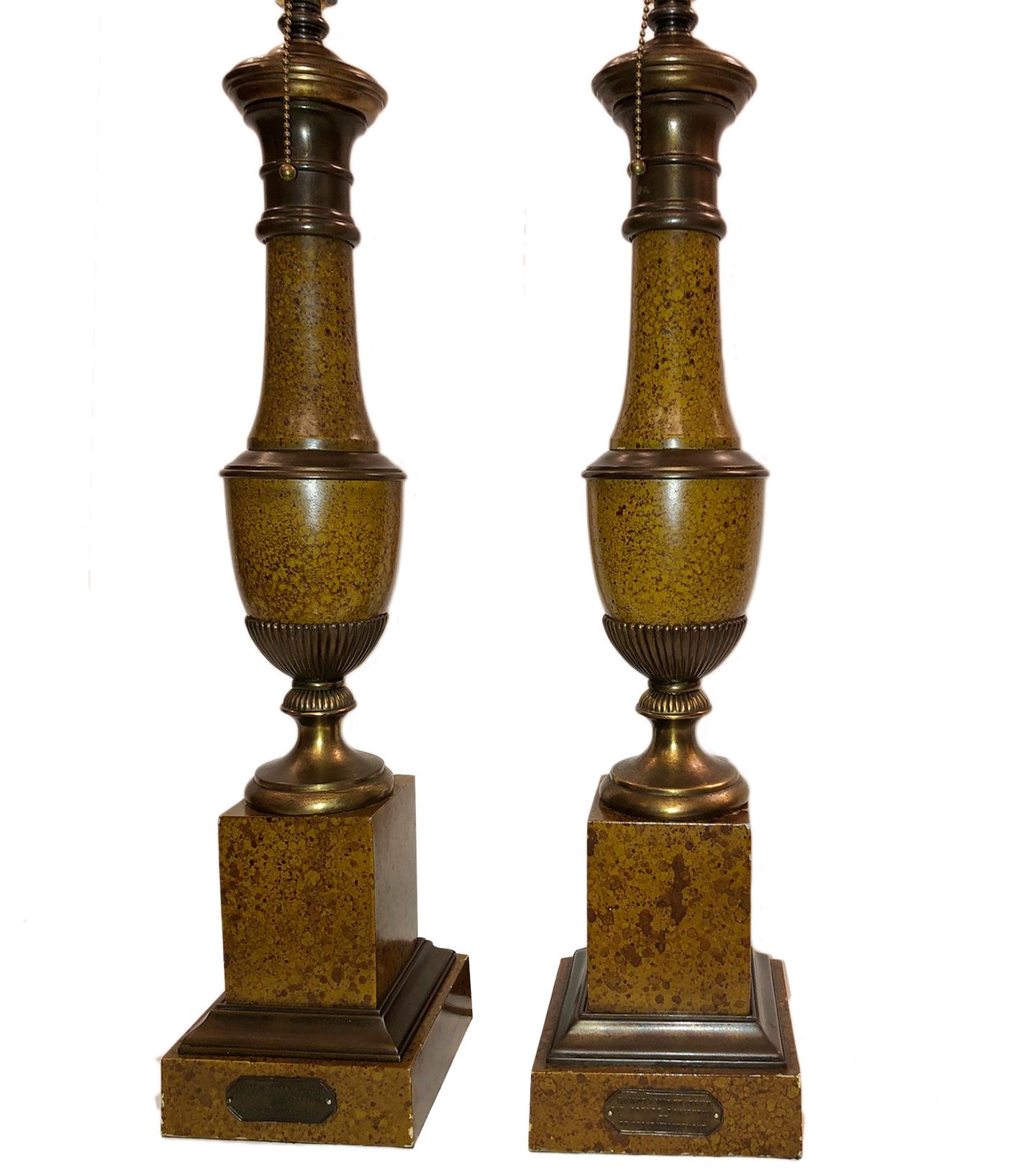 Pair of circa 1940s French painted tole lamps with original finish and factory mark on base.

Measurements:
Height of body 22.5
