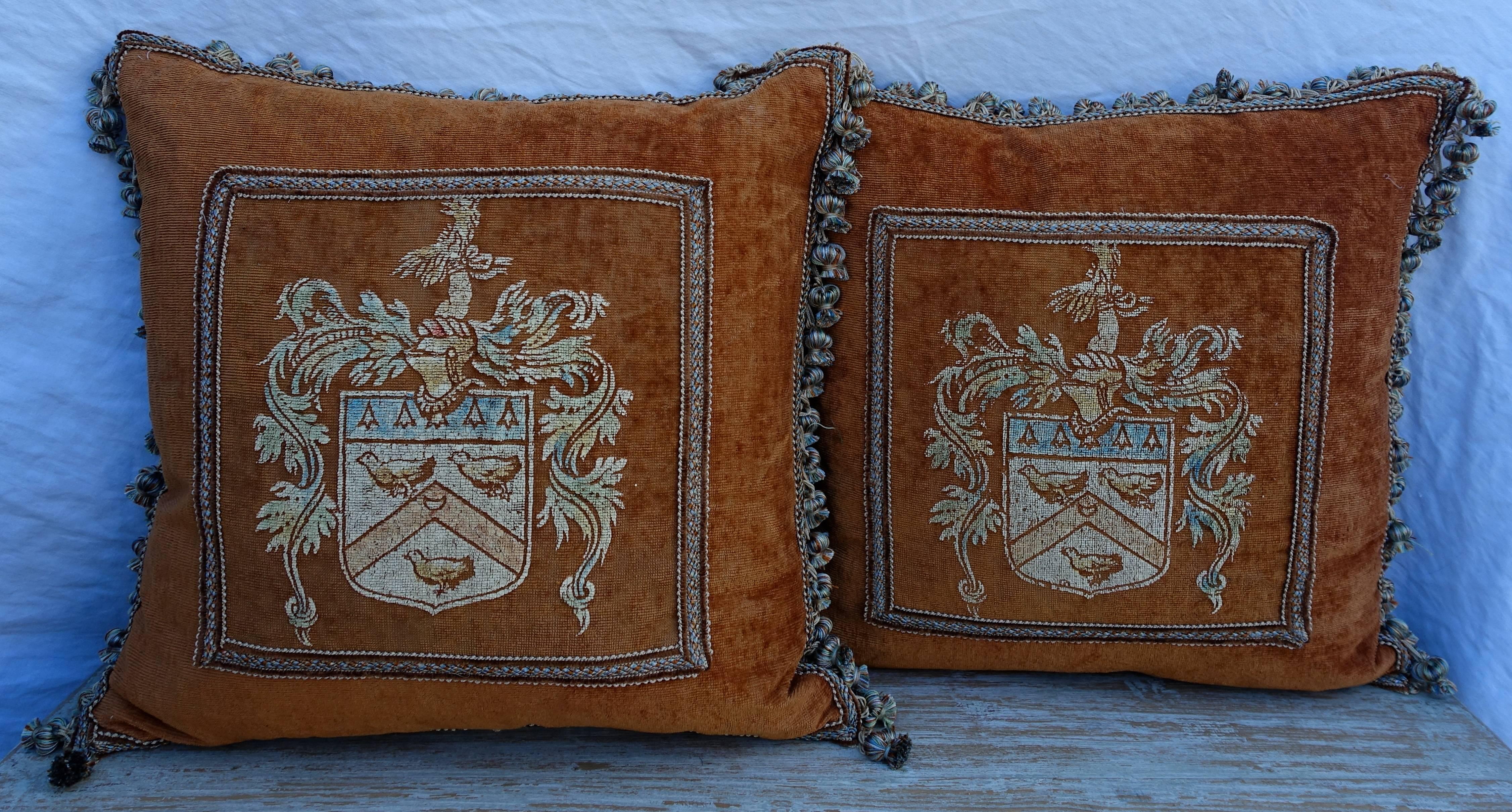 Pair of custom pillows made with 19th century painted velvet combined with silk backs and tassel trim all around. Down filled inserts, sewn shut.