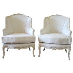 Pair of Painted White Louis XV Style Linen Upholstered Bergère Chairs