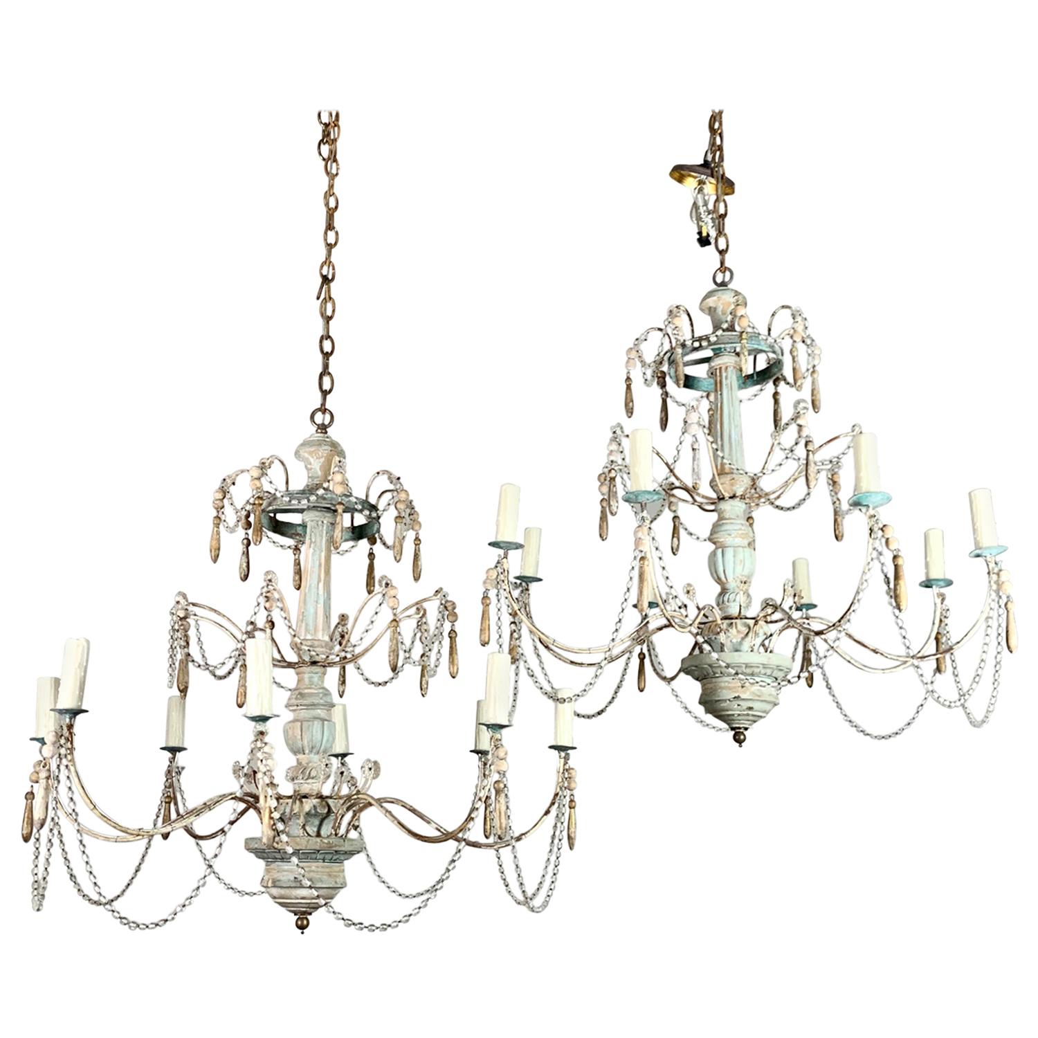 Pair of Painted Wood Beaded Chandeliers by MLA For Sale