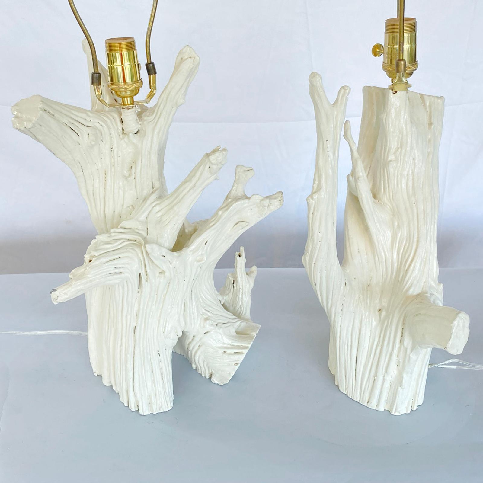 Unusual pair of vIntage, painted arboreal lamps, each solid and heavy twisted root fragment, wired with a three-way socket; matching root finials. 

Second lamp measures 26.5