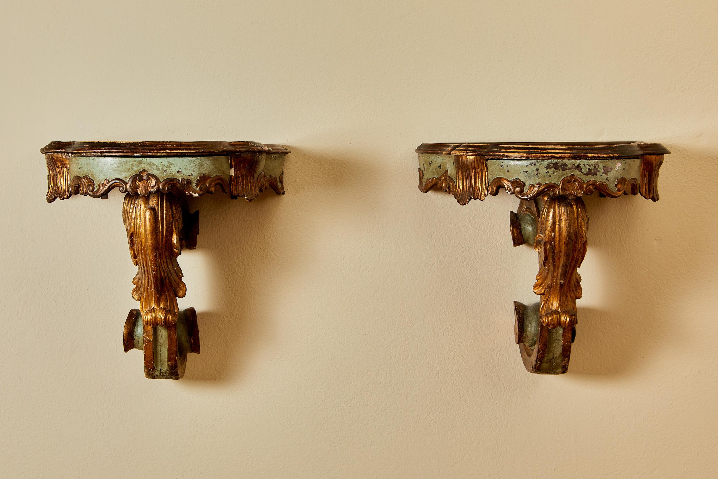 Italian Pair of painted wooden wall consoles in the style of Venetian Rocaille. For Sale