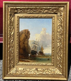 Paire de peintures de navires déchargeant une cargaison sur la plage par Edmund John Niemann
