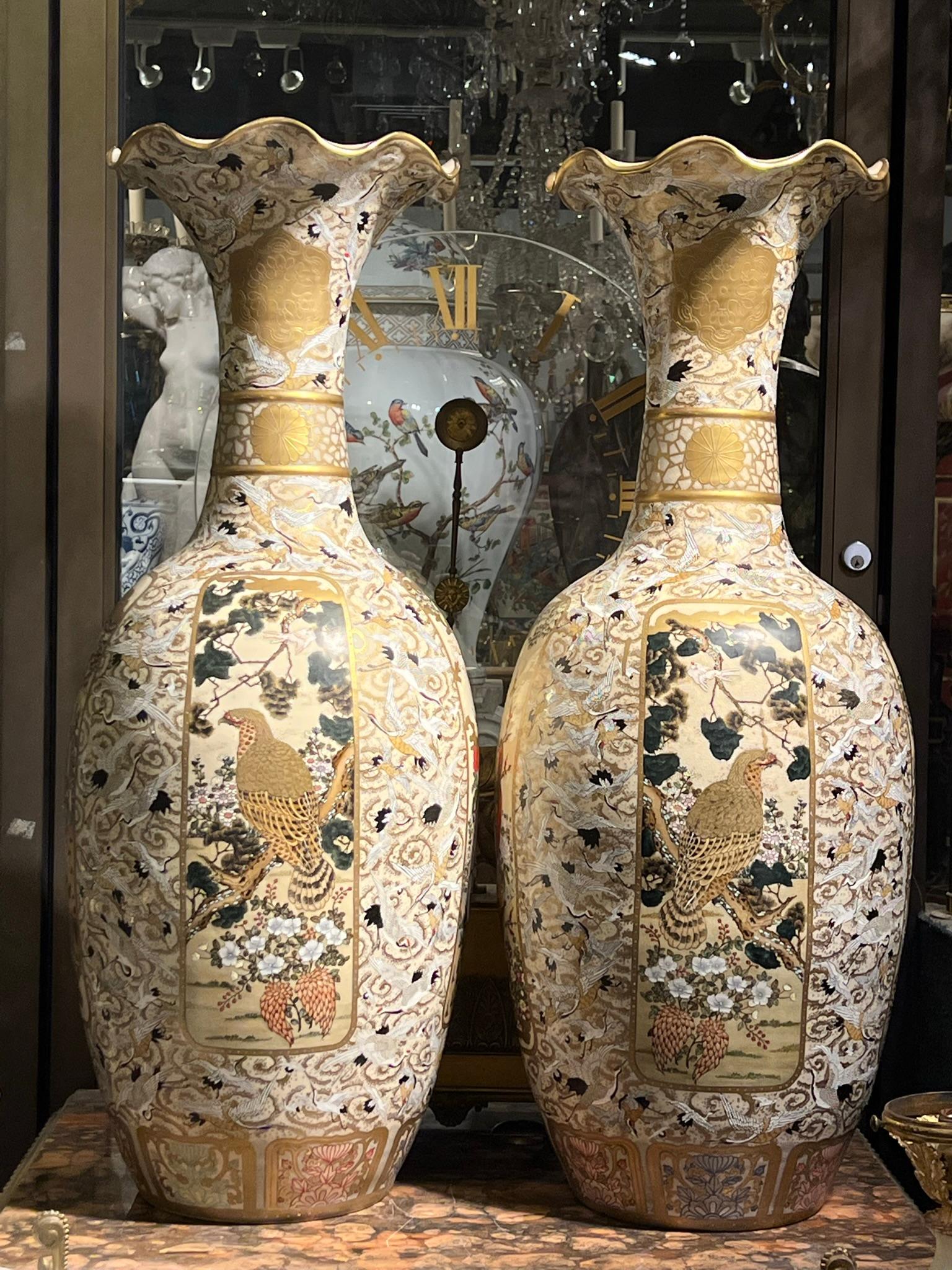 Pair of finest quality Japanese Palace size Meiji period satsuma vases hand painted and Enameled with Cranes and various birds and flowers.