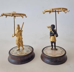 Pair of Palais Royal Ring Stands Depicting Robinson Crusoe and Man Friday