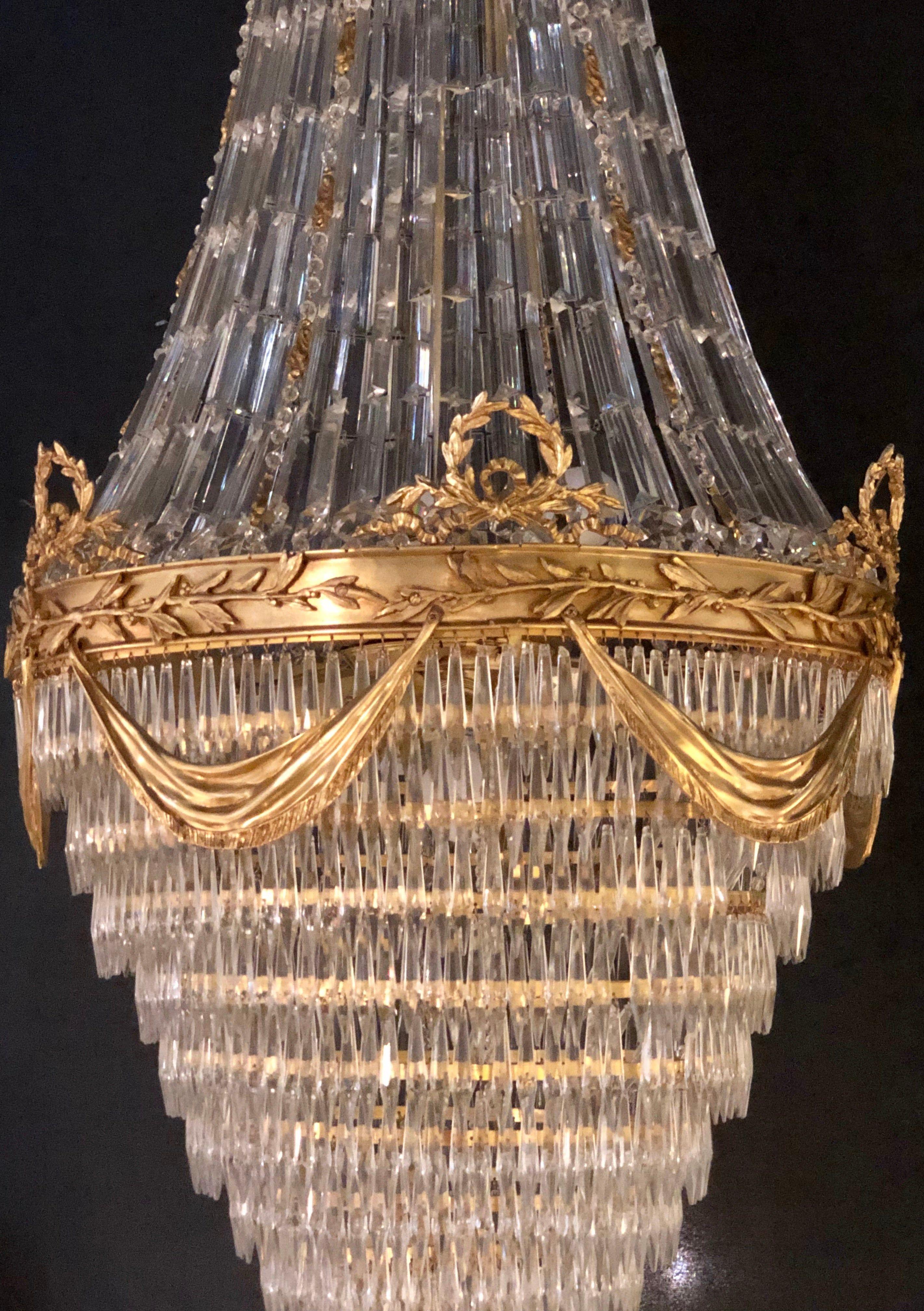 Pair of Palatial Bronze and Crystal Swag Design Louis XVI Style Chandeliers For Sale 1