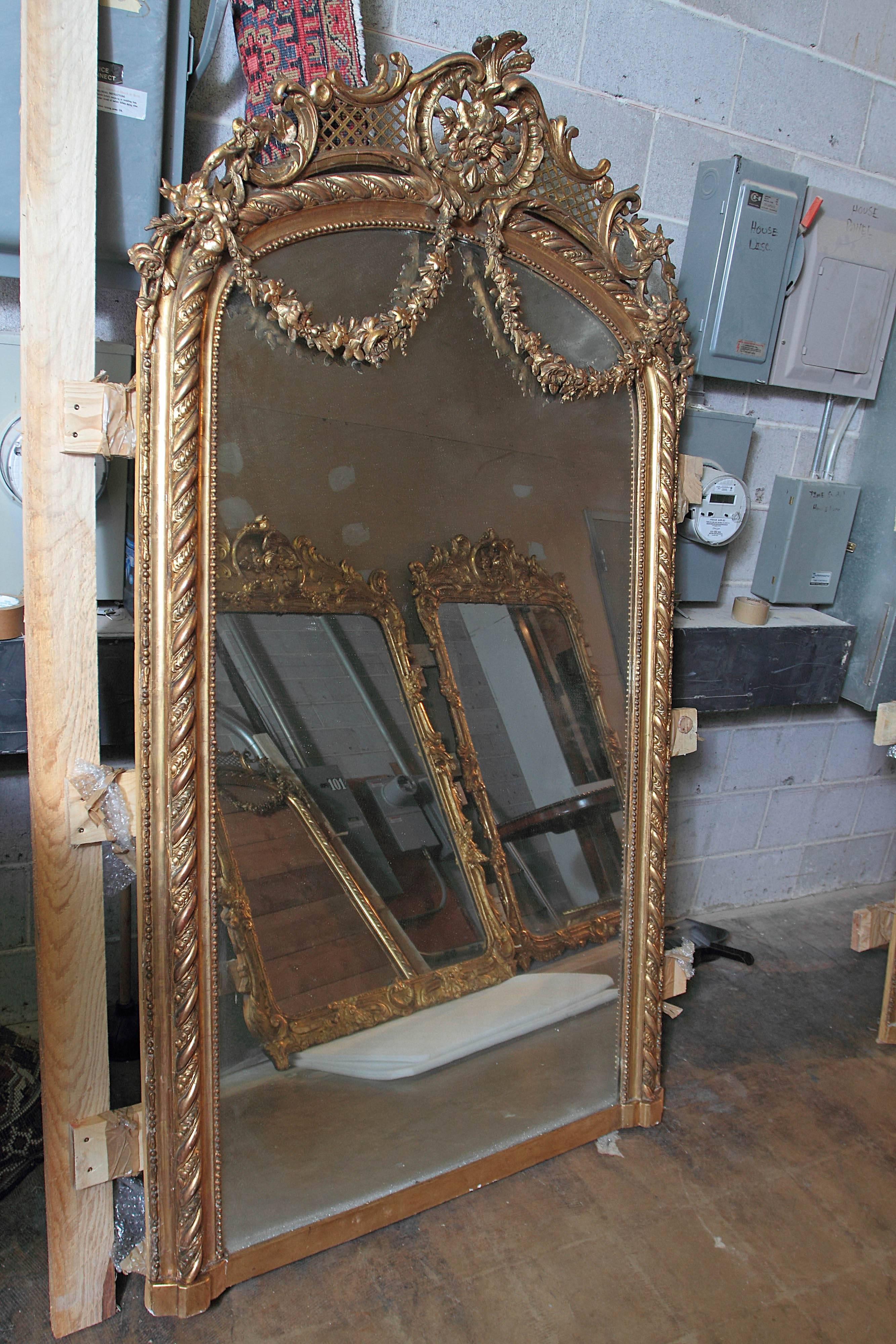 Pair of beautiful French 19th century palatial Louis XV gilt carved mirrors.