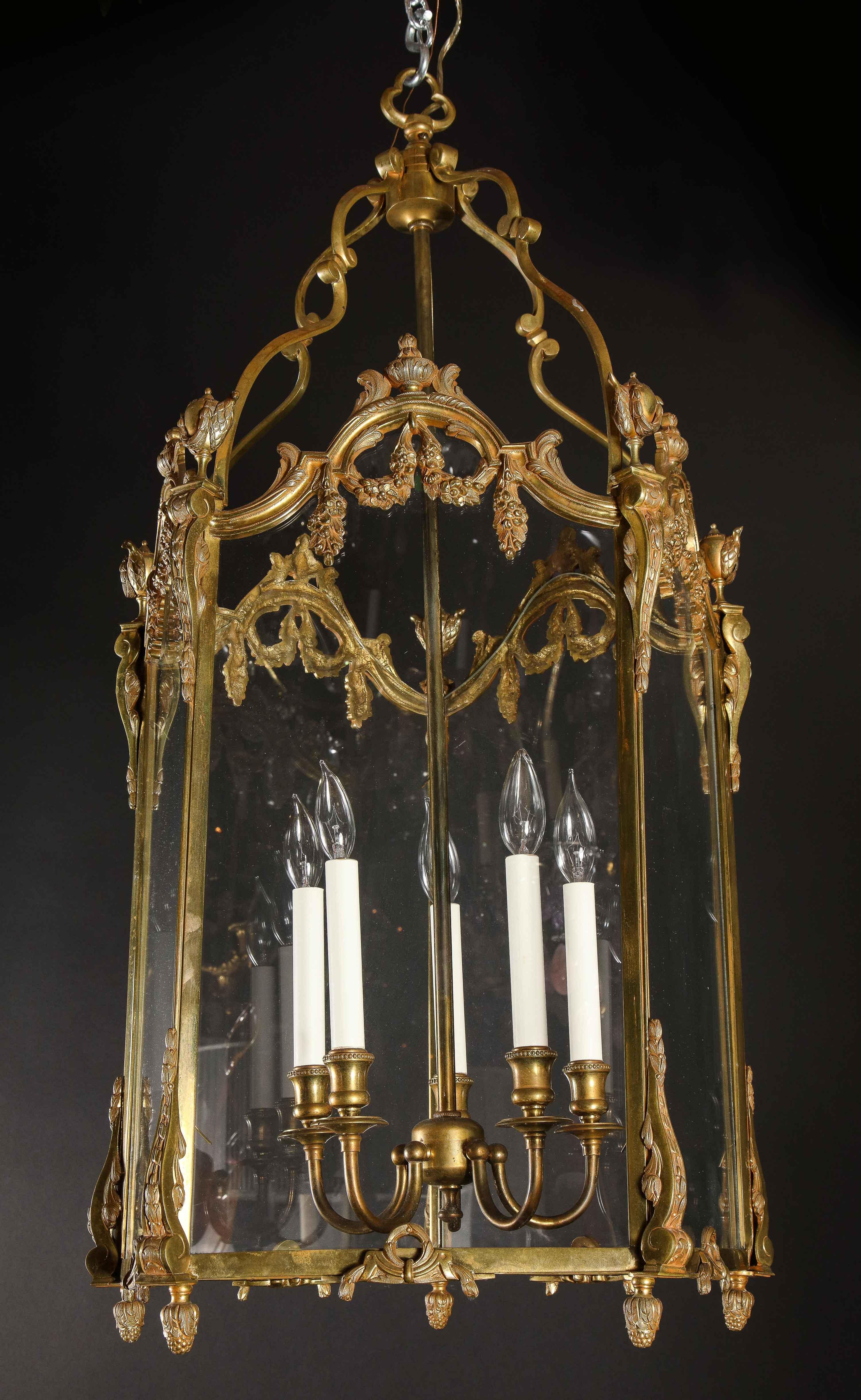 Pair of Palatial French Louis XVI Style Gilt Bronze and Glass Lanterns In Good Condition In New York, NY
