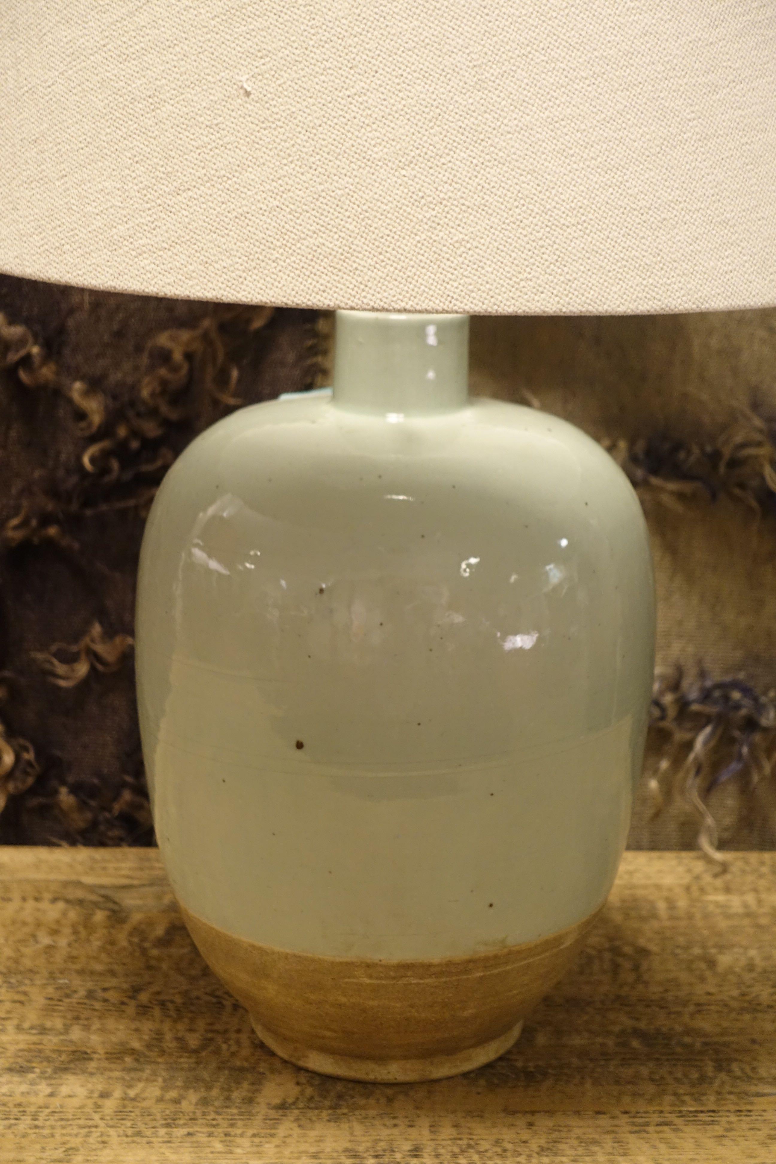 Contemporary Chinese pair of pale blue terracotta lamps with exposed terra cotta base.
New Belgian linen shades
Newly rewired
Measures: Overall height 23