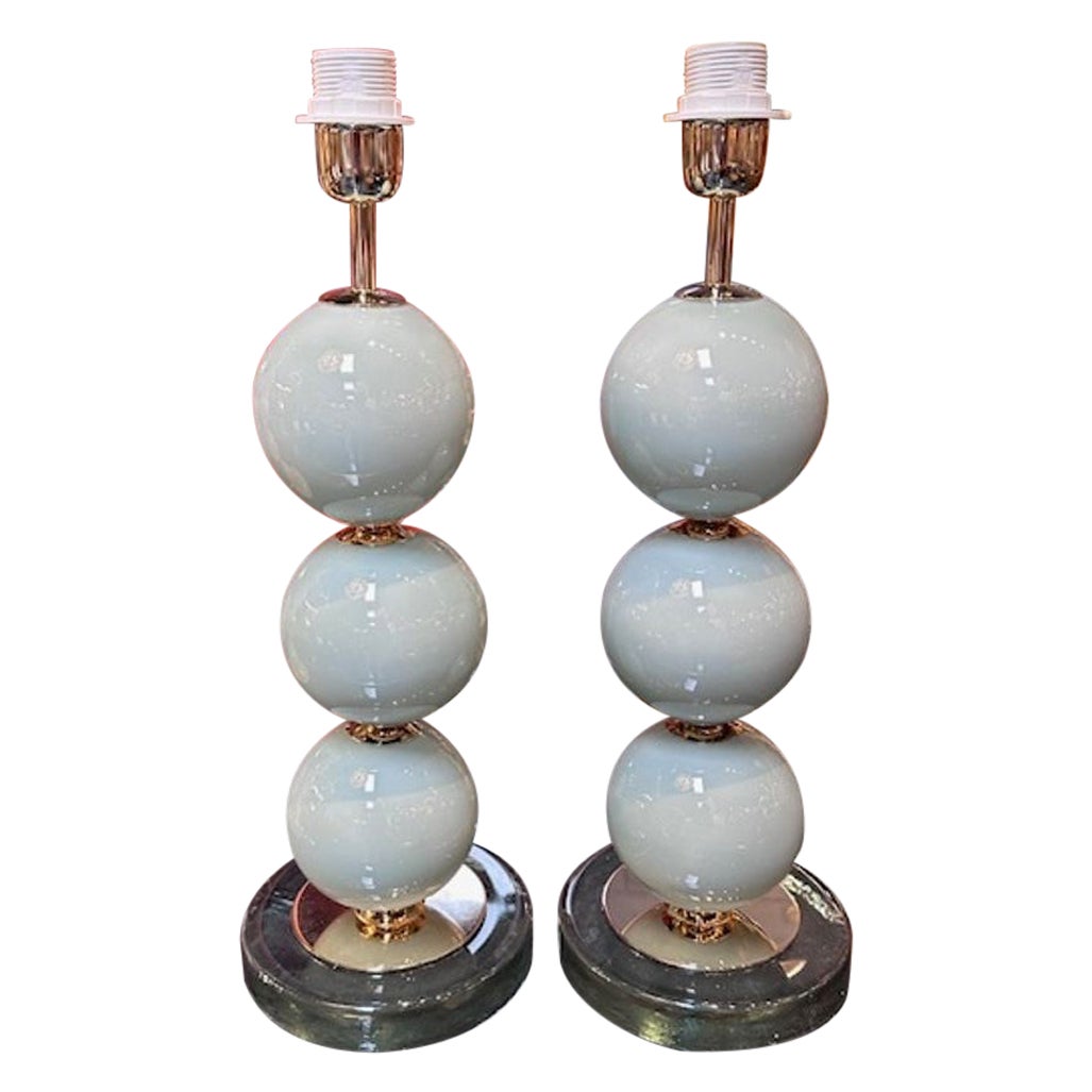 Pareja de lámparas en forma de bola de cristal de Murano azul pálido