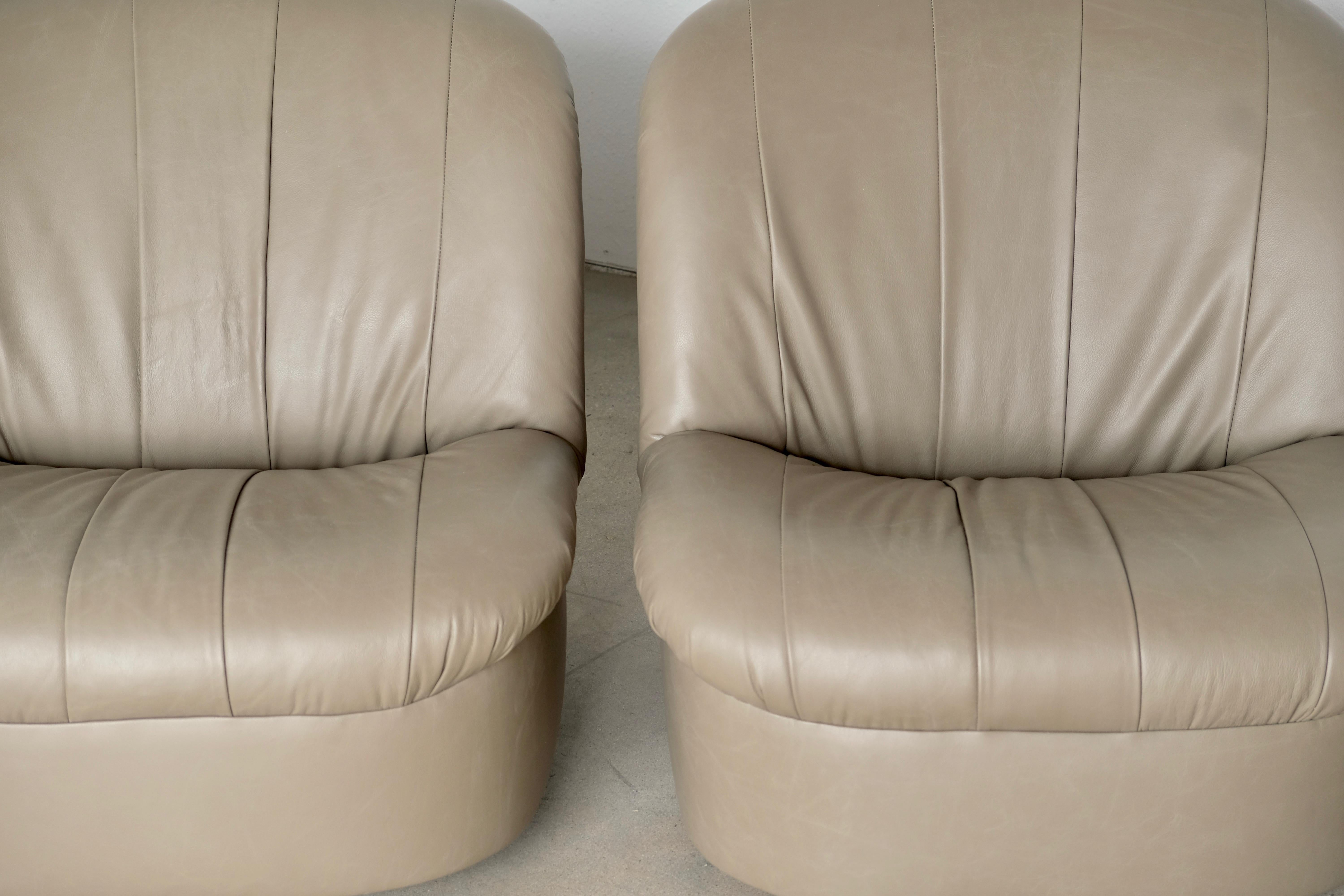 American Pair of Pale Olive Green Leather Low 1970s Swivel Slipper Lounge Chairs