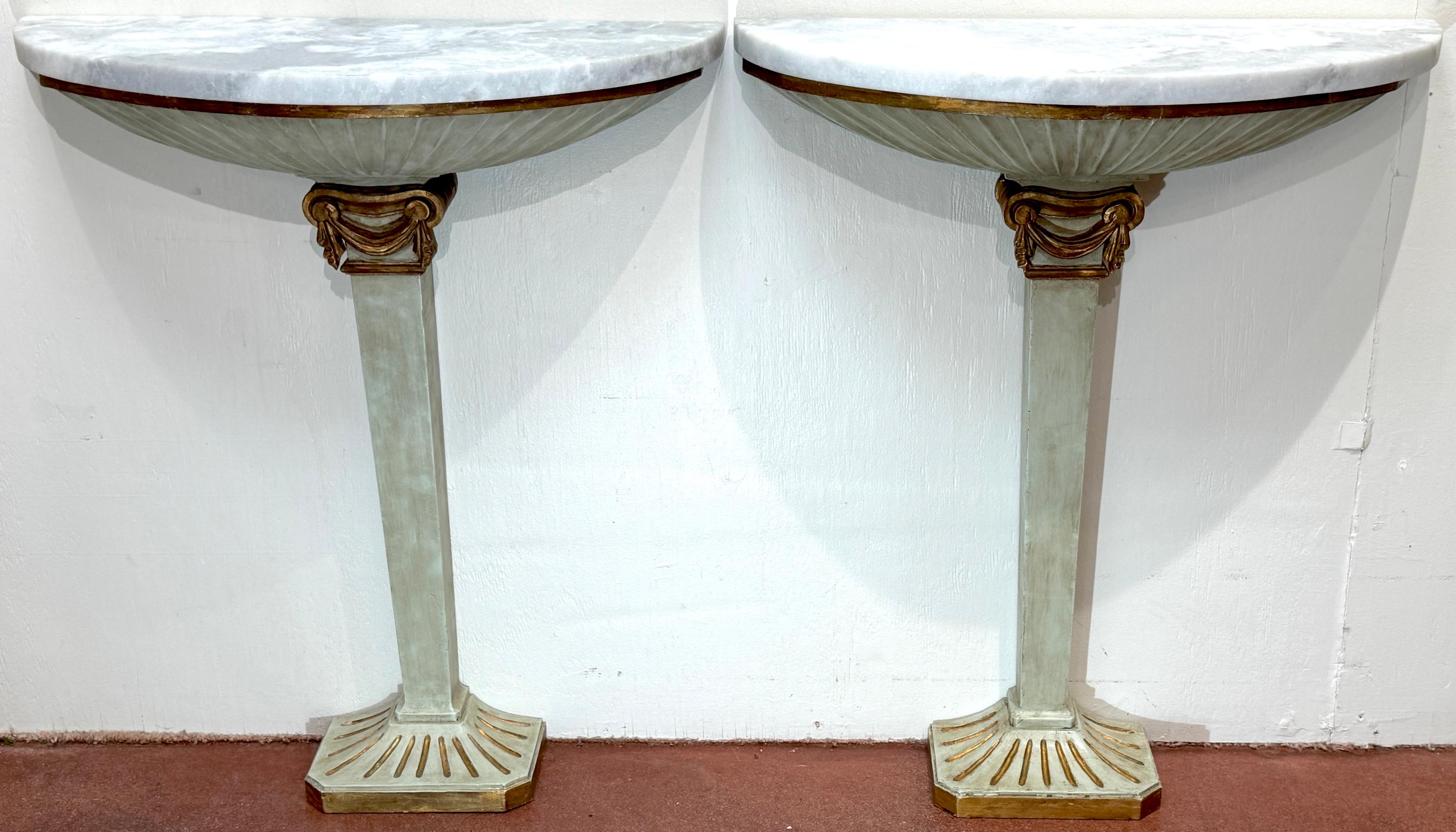 Pair of Pallido Italy Neoclassical Stylized Urn Giltwood & Marble Console Tables, Italy, Circa 1950s

A refined pair of mid-century Italian console tables by Pallido, made in a Neoclassical style with elegant proportions and luxurious materials.