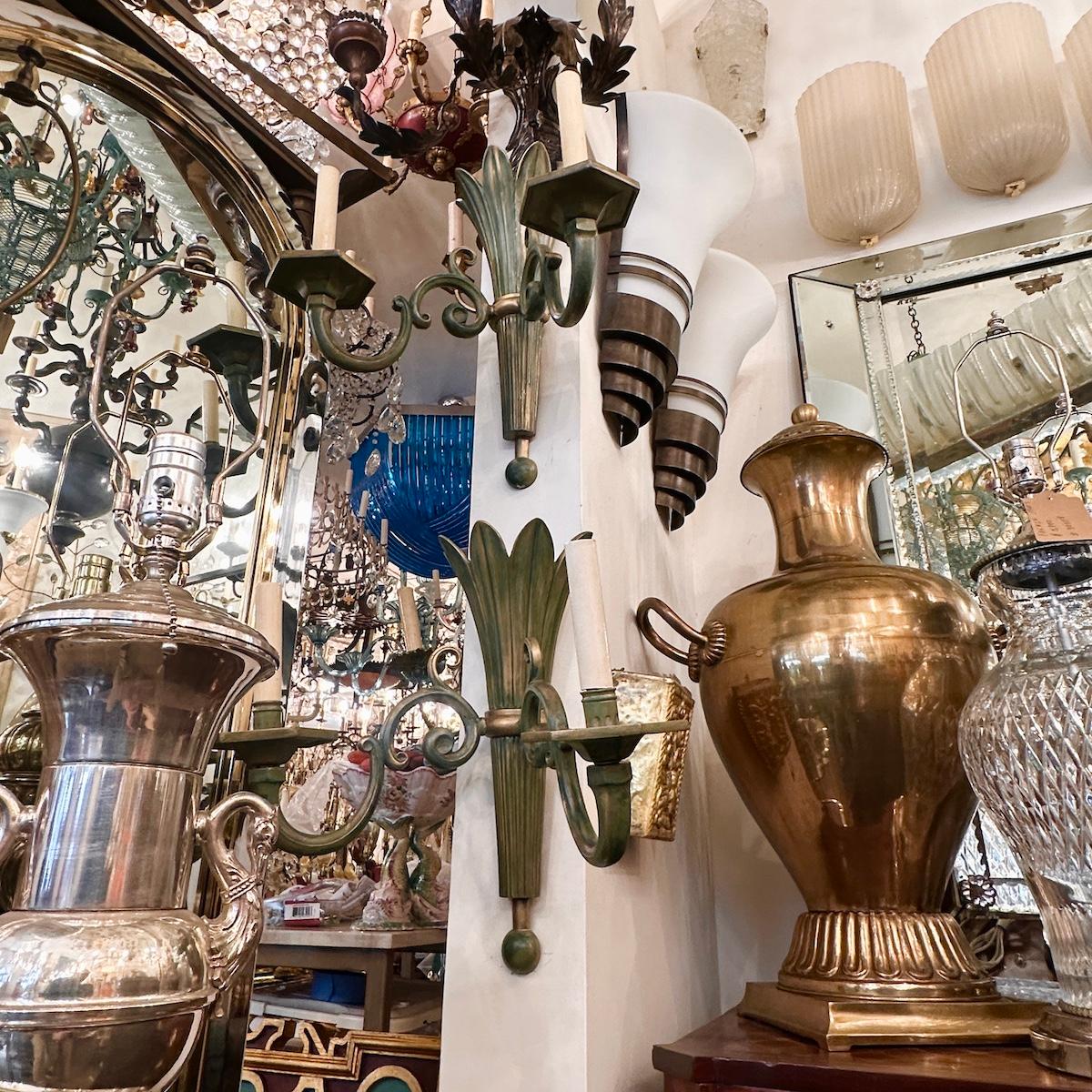 Pair of circa 1940's French palm shaped patinated and gilt sconces.

Measurements:
Height: 15