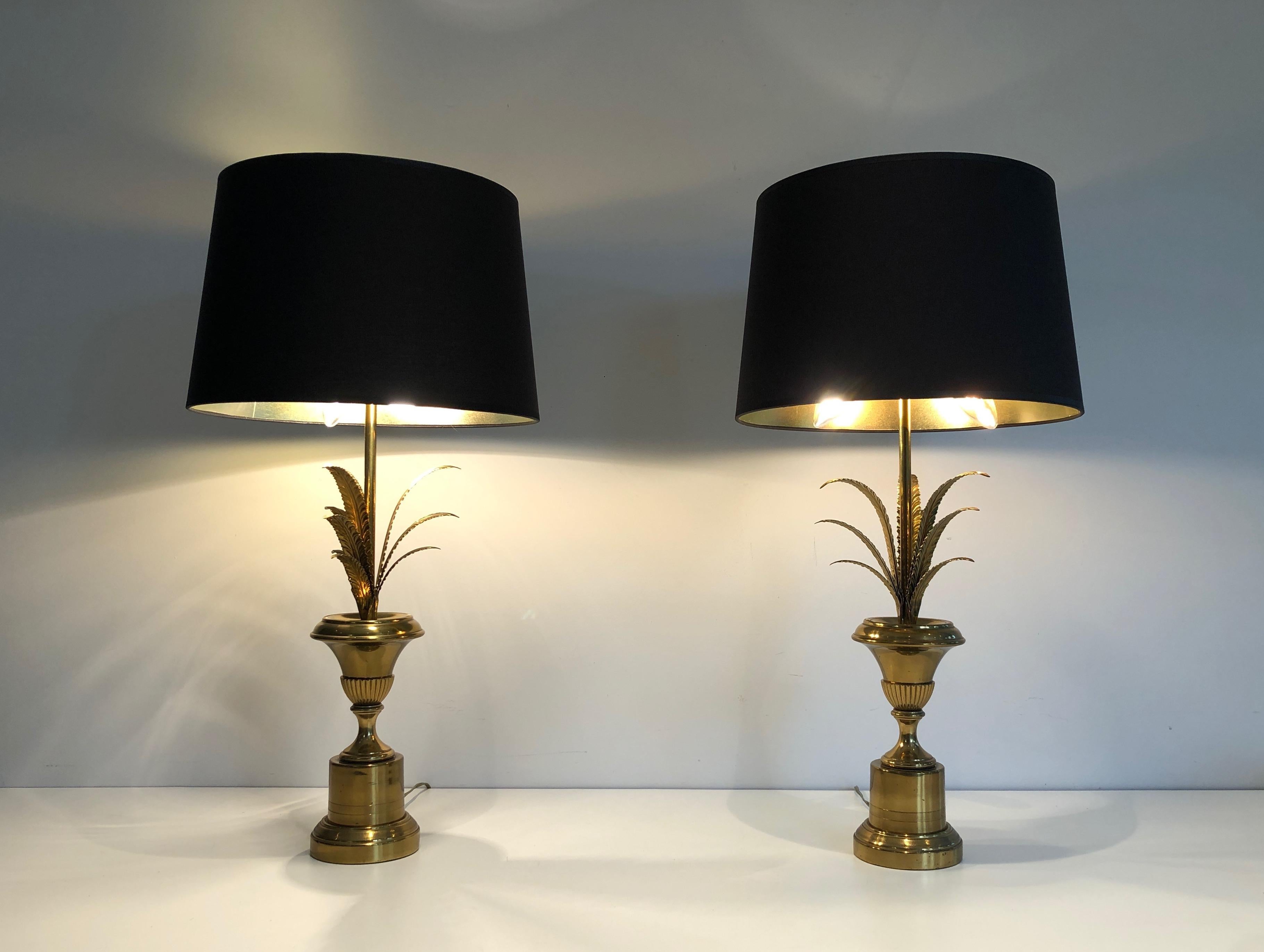 This nice pair of palm tree neoclassical style wall Lights is made of brass. This is a  nice model in the style of famous French Design Maison Charles. Circa 1970