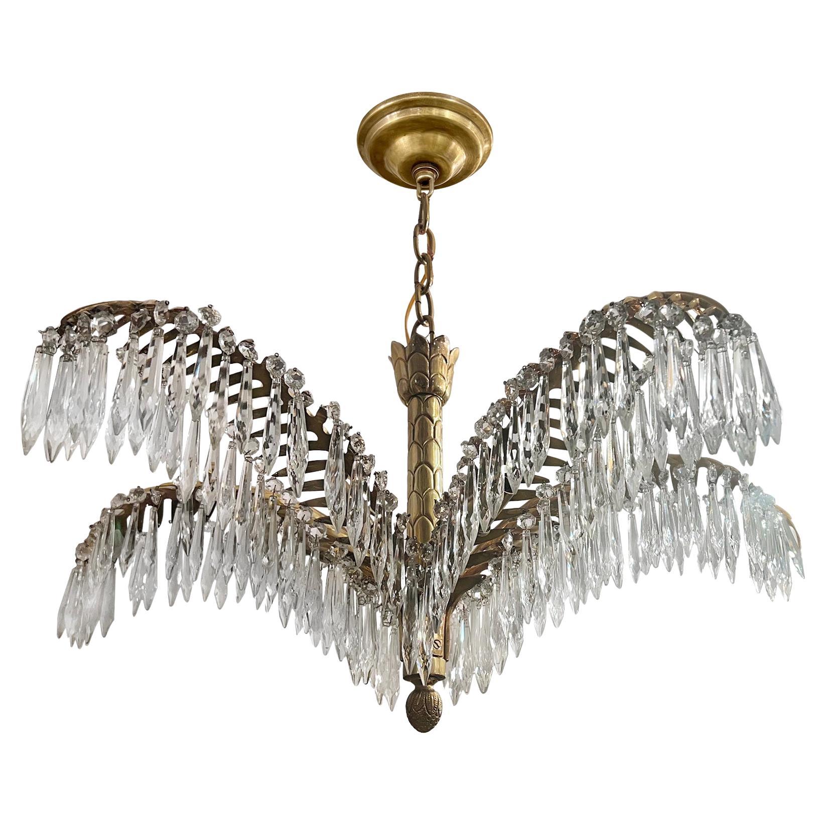 Pair of Palm Tree Chandeliers. Sold individually.