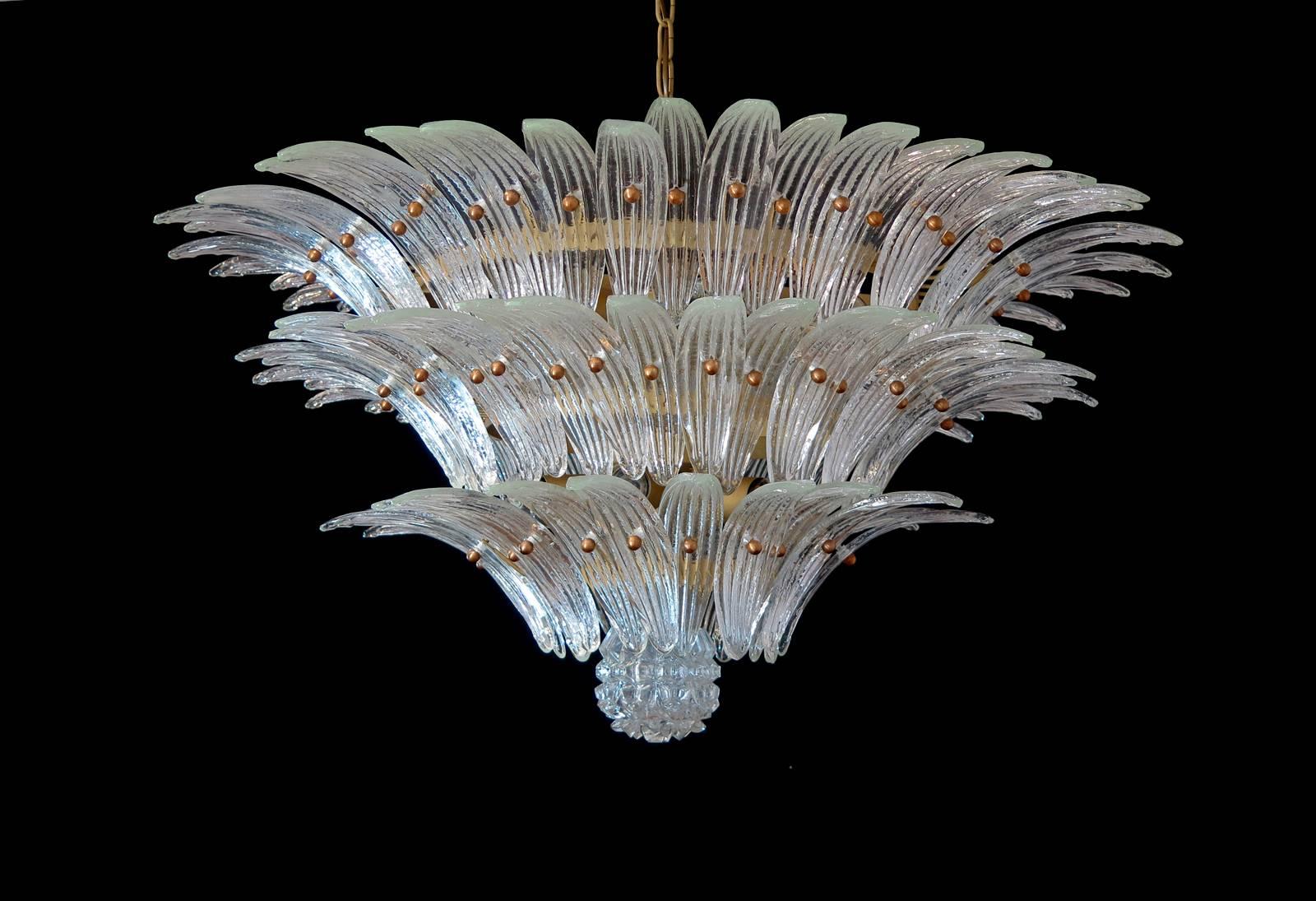 Palmette ceiling light made by 104 Murano transparent glasses in a gold metal frame. Murano
blown glass in a traditional way. Structure in gold colored metal.
Period:1980s
Dimensions: 47,25 inches (120 cm) height with chain; 25,60 inches (65 cm)